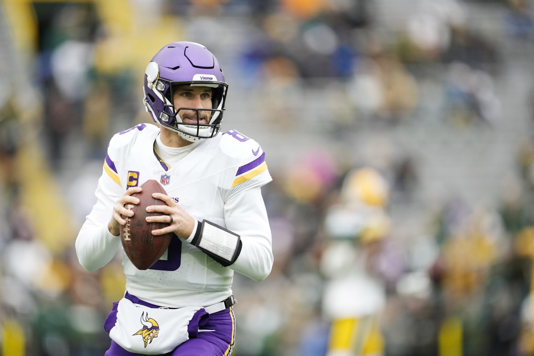 GREEN BAY, WISCONSIN - OCTOBER 29: Kirk Cousins #8 of the Minnesota Vikings warms up before a game against the Green Bay Packers at Lambeau Field on October 29, 2023 in Green Bay, Wisconsin. (Photo by Patrick McDermott/Getty Images)
