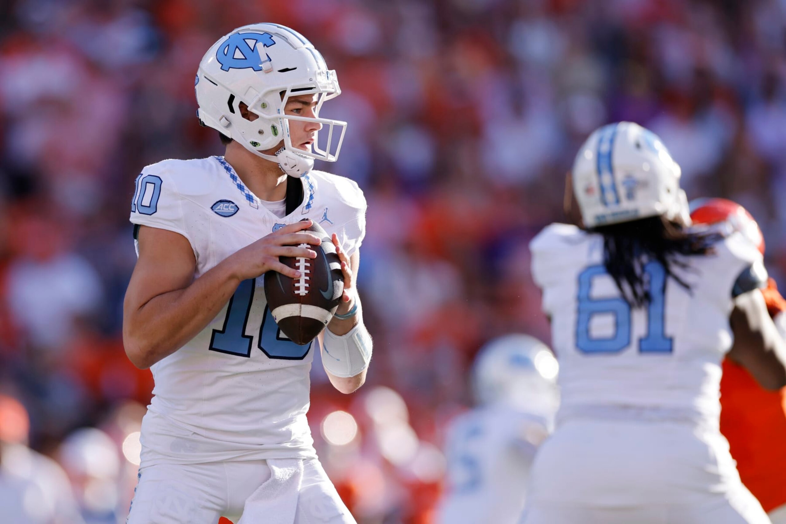 CLEMSON, SC - NOVEMBER 18: North Carolina Tar Heels quarterback Drake Maye (10) drops back to pass during a college football game against the Clemson Tigers on November 18, 2023 at Memorial Stadium in Clemson, South Carolina. (Photo by Joe Robbins/Icon Sportswire via Getty Images) CLEMSON, SC - NOVEMBER 18: North Carolina Tar Heels quarterback Drake Maye (10) drops back to pass during a college football game against the Clemson Tigers on November 18, 2023 at Memorial Stadium in Clemson, South Carolina. (Photo by Joe Robbins/Icon Sportswire via Getty Images)