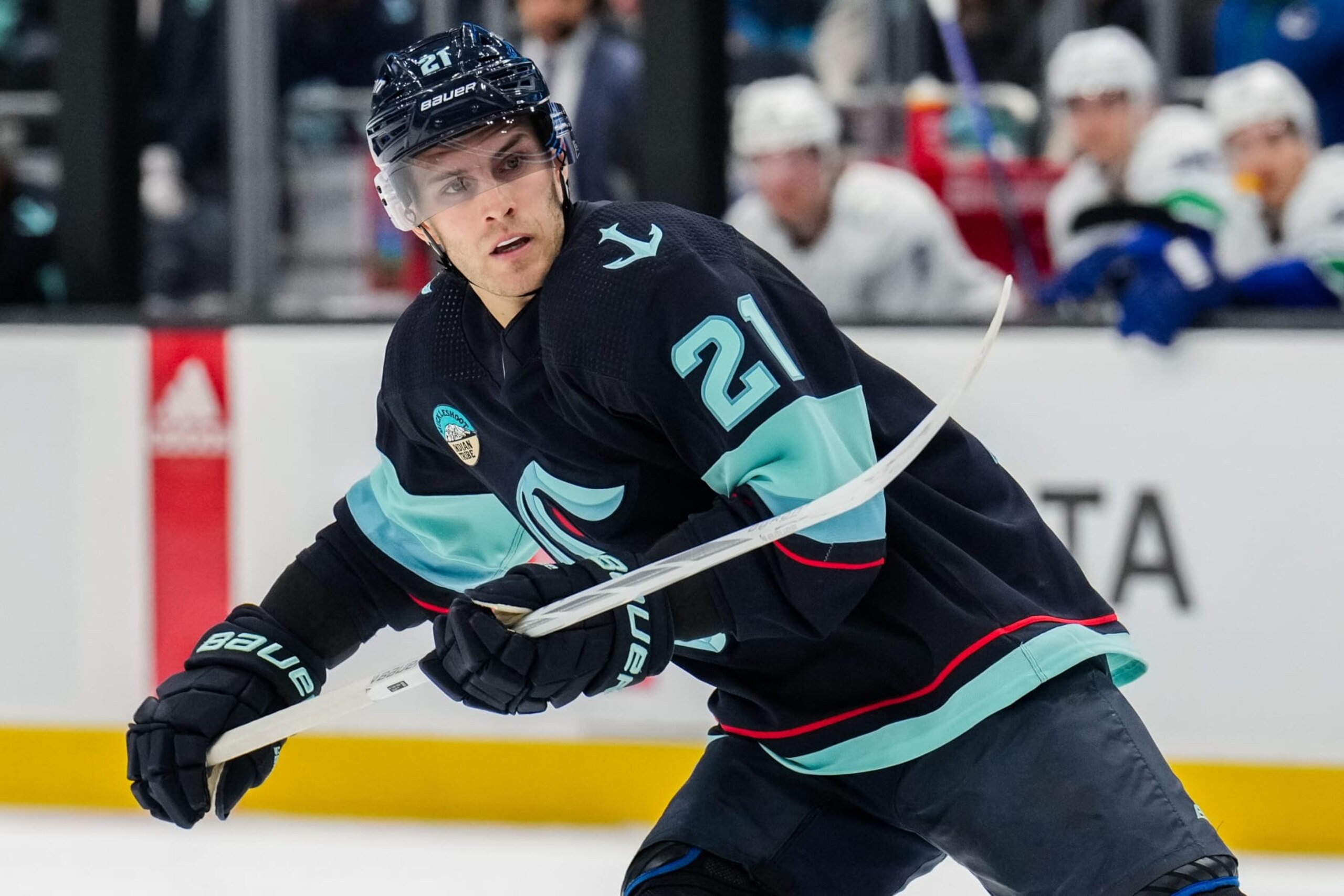 SEATTLE, WASHINGTON - FEBRUARY 22: Alex Wennberg #21 of the Seattle Kraken skates during the first period of a game against the Vancouver Canucks at Climate Pledge Arena on February 22, 2024 in Seattle, Washington. (Photo by Christopher Mast/NHLI via Getty Images)