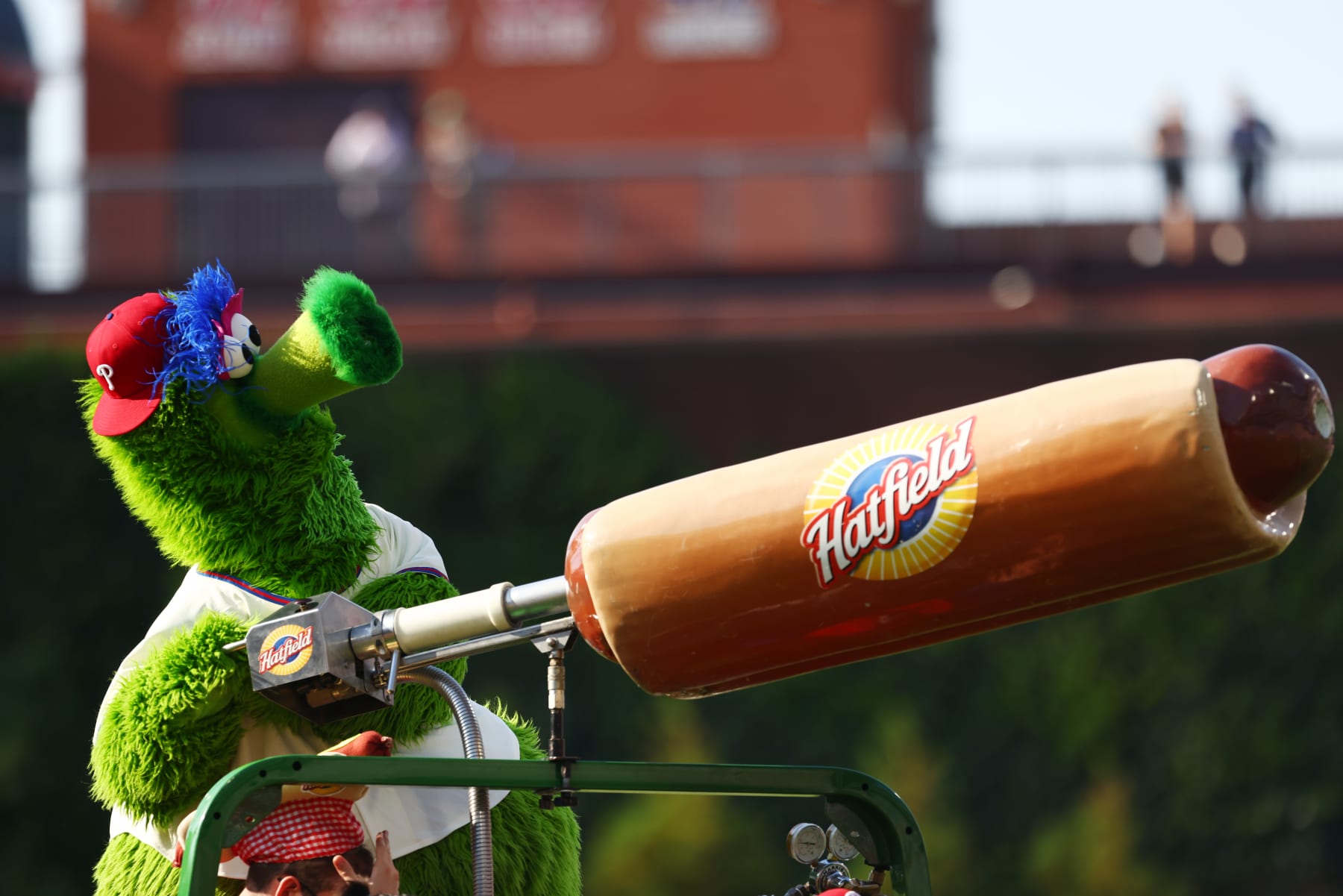 PHILADELPHIA, PA - MAY 30: The Phillie Phanatic shoots hotdogs into the stands during a game against the San Francisco Giants at Citizens Bank Park on May 30, 2022 in Philadelphia, Pennsylvania. (Photo by Rich Schultz/Getty Images)
