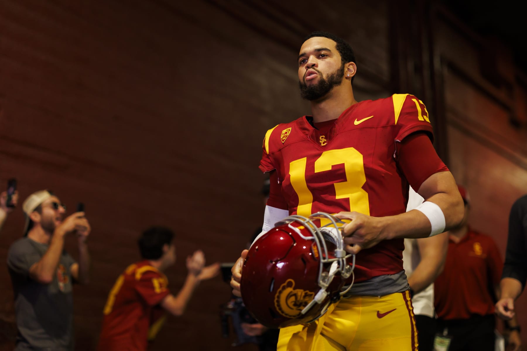 LOS ANGELES, CALIFORNIA - NOVEMBER 18: Caleb Williams #13 of the USC Trojans walks to the field for team entrances prior to a game against the UCLA Bruins at United Airlines Field at the Los Angeles Memorial Coliseum on November 18, 2023 in Los Angeles, California. (Photo by Ryan Kang/Getty Images)