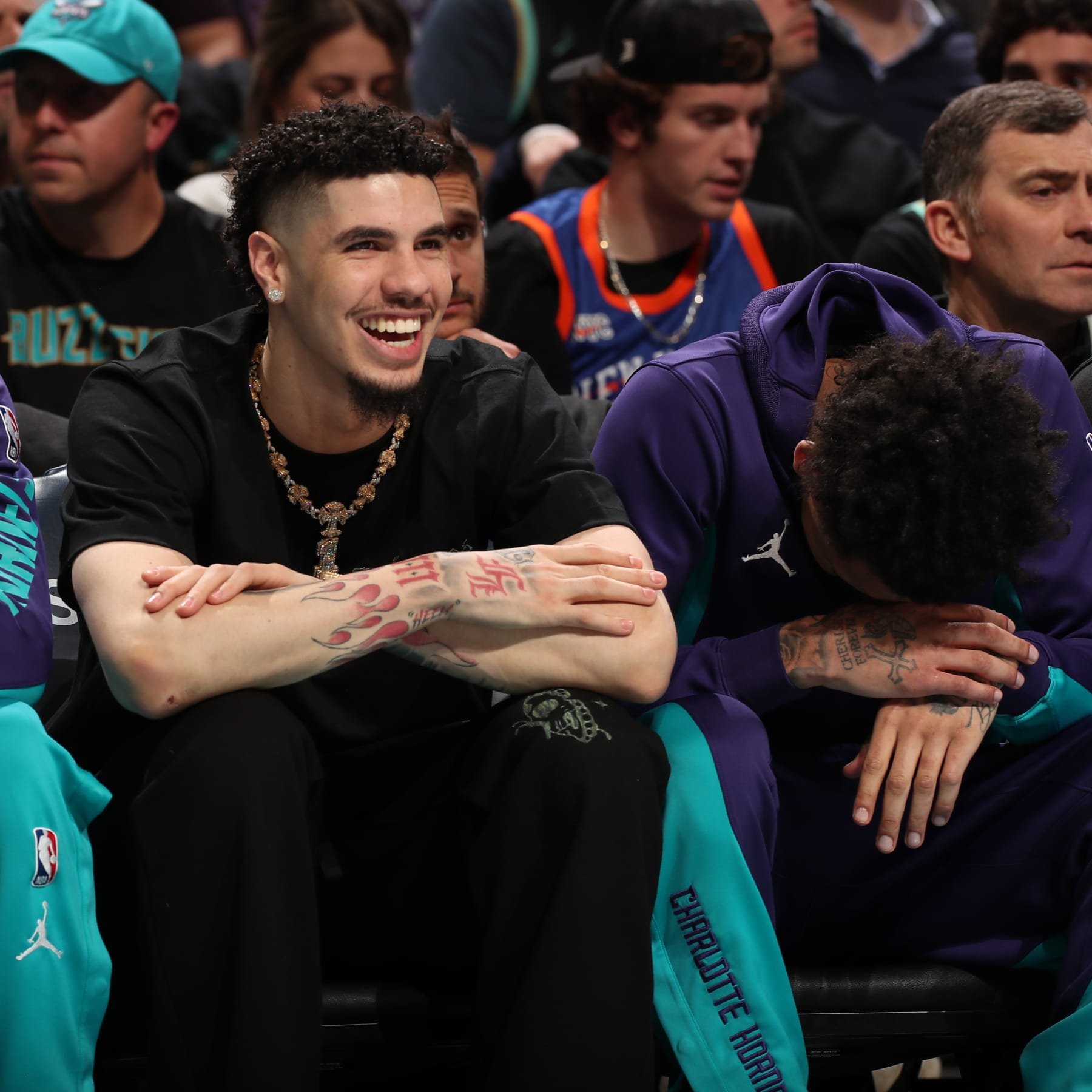 CHARLOTTE, NC - JANUARY 29: LaMelo Ball #1 of the Charlotte Hornets and James Bouknight #2 laugh on the bench during the game against the New York Knicks on January 29, 2024 at Spectrum Center in Charlotte, North Carolina. NOTE TO USER: User expressly acknowledges and agrees that, by downloading and or using this photograph, User is consenting to the terms and conditions of the Getty Images License Agreement. Mandatory Copyright Notice: Copyright 2024 NBAE (Photo by Kent Smith/NBAE via Getty Images)