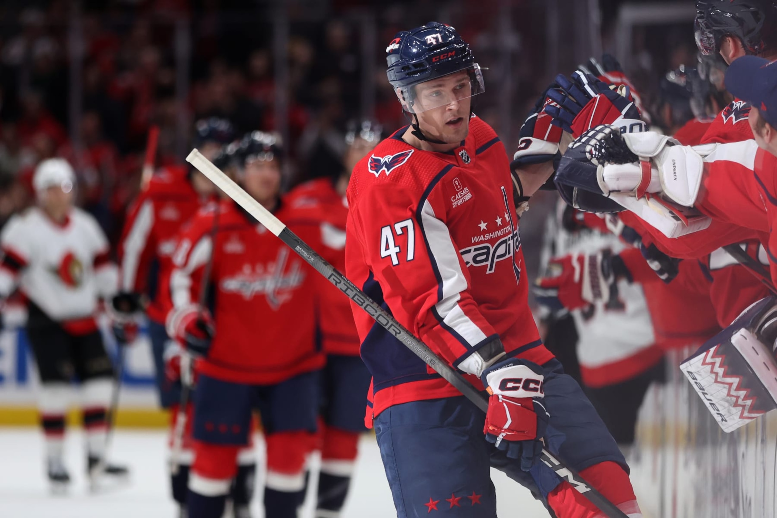 WASHINGTON, DC - FEBRUARY 26: Beck Malenstyn #47 of the Washington Capitals celebrates with teammates after scoring a goal against the Ottawa Senators during the first period at Capital One Arena on February 26, 2024 in Washington, DC. (Photo by Patrick Smith/Getty Images)