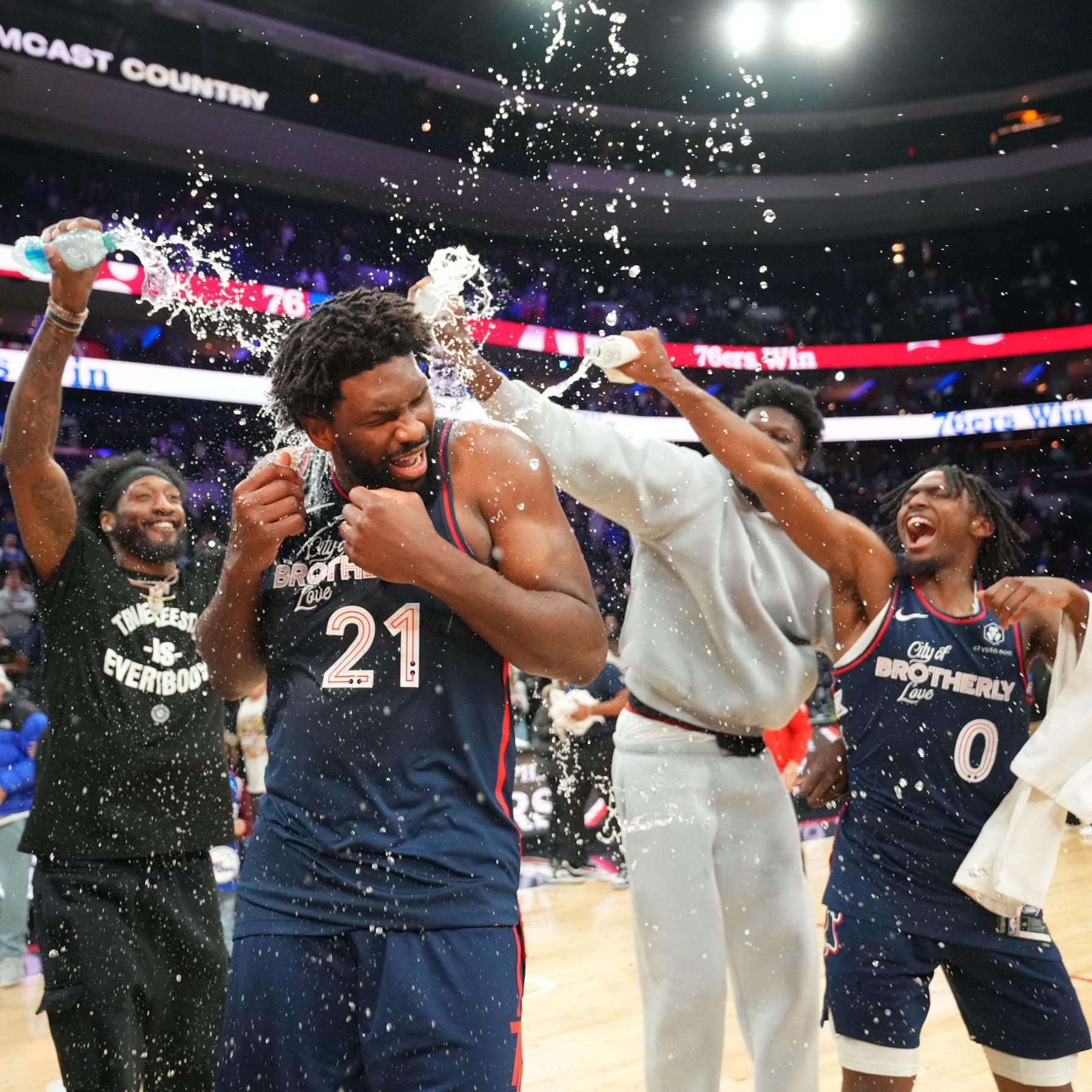 PHILADELPHIA, PA - JANUARY 22: Joel Embiid #21 of the Philadelphia 76ers celebrates with teammates after setting a new franchise record of 70 points during the game against the San Antonio Spurs on January 22, 2024 at the Wells Fargo Center in Philadelphia, Pennsylvania NOTE TO USER: User expressly acknowledges and agrees that, by downloading and/or using this Photograph, user is consenting to the terms and conditions of the Getty Images License Agreement. Mandatory Copyright Notice: Copyright 2024 NBAE (Photo by Jesse D. Garrabrant/NBAE via Getty Images)