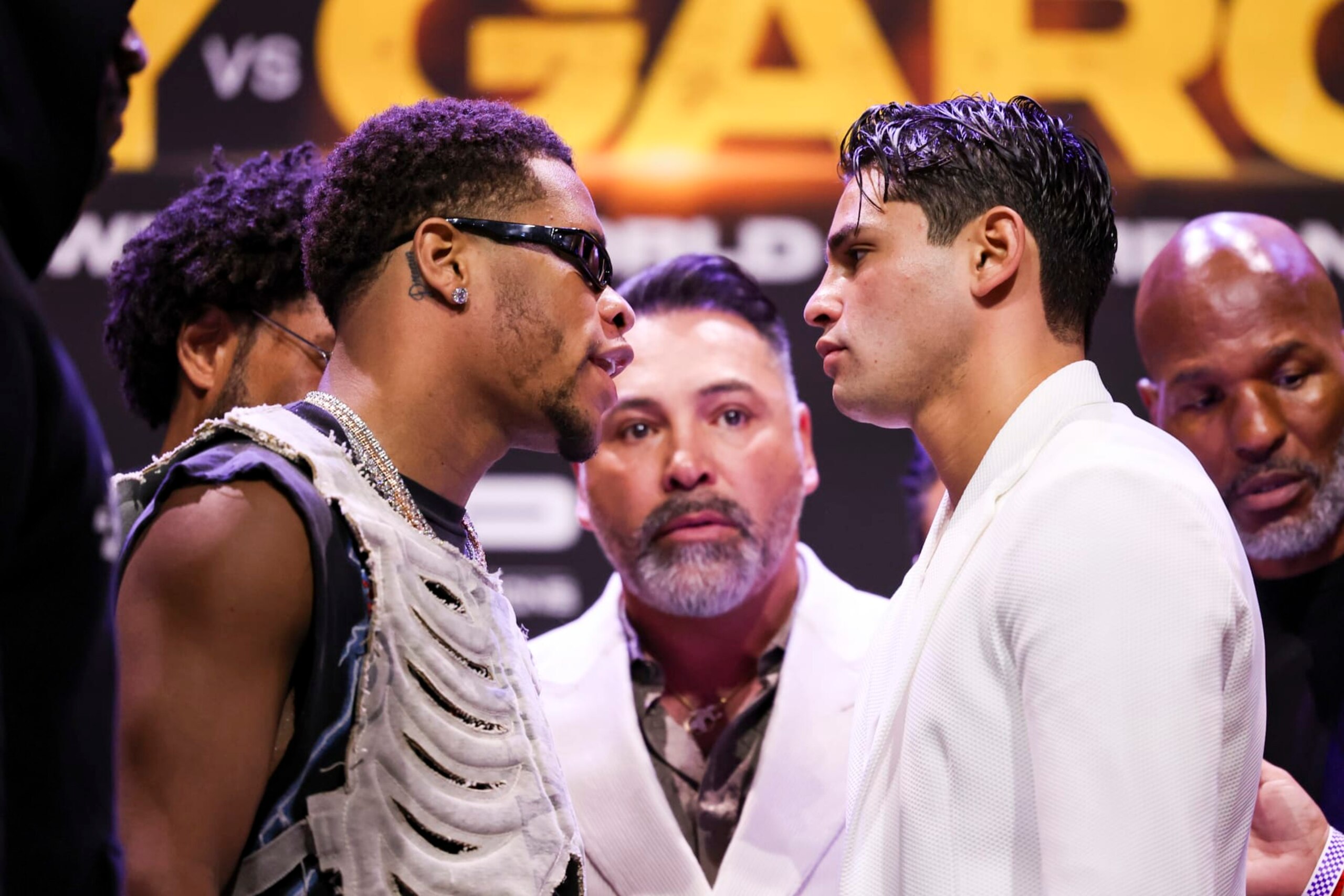 LOS ANGELES, CALIFORNIA - FEBRUARY 29: Devin Haney and Ryan Garcia face off during the Ryan Garcia v Devin Haney press tour at Avalon Hollywood & Bardot on February 29, 2024 in Los Angeles, California. (Photo by Cris Esqueda/Golden Boy/Getty Images)