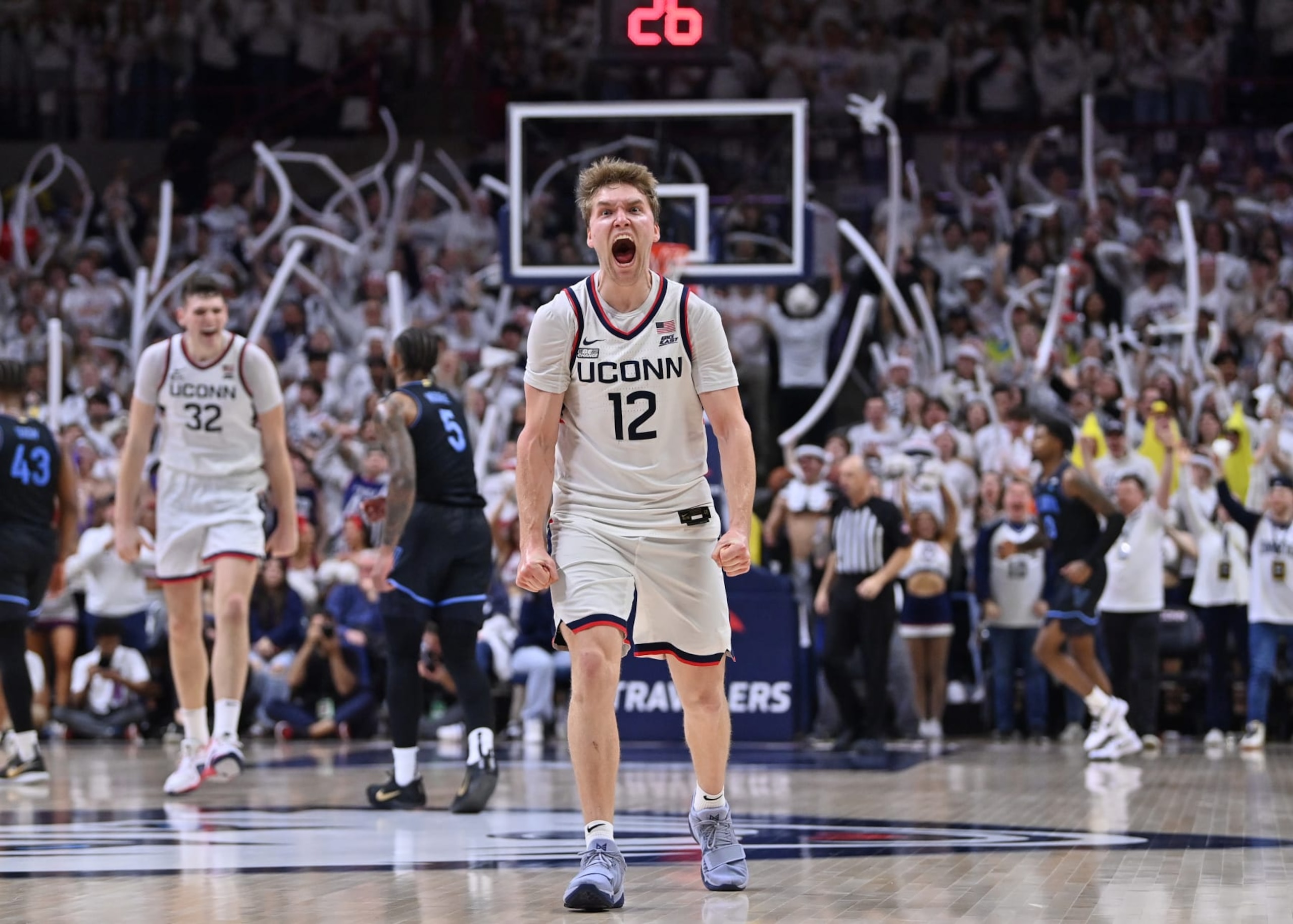 STORRS, CT - FEBRUARY 24: UConn Huskies guard Cam Spencer (12) reacts to a play during the game as the Villanova Wildcats take on the UConn Huskies on February 24, 2024 at the Gampel Pavilion in Storrs, CT (Photo by Williams Paul/Icon Sportswire via Getty Images) STORRS, CT - FEBRUARY 24: UConn Huskies guard Cam Spencer (12) reacts to a play during the game as the Villanova Wildcats take on the UConn Huskies on February 24, 2024 at the Gampel Pavilion in Storrs, CT (Photo by Williams Paul/Icon Sportswire via Getty Images)