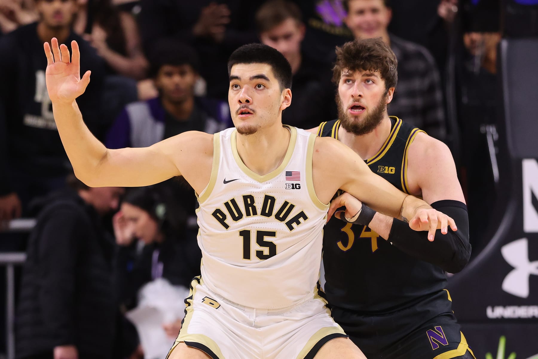 EVANSTON, ILLINOIS - DECEMBER 01: Zach Edey #15 of the Purdue Boilermakers is defended by Matthew Nicholson #34 of the Northwestern Wildcats during the first half at Welsh-Ryan Arena on December 01, 2023 in Evanston, Illinois. (Photo by Michael Reaves/Getty Images)