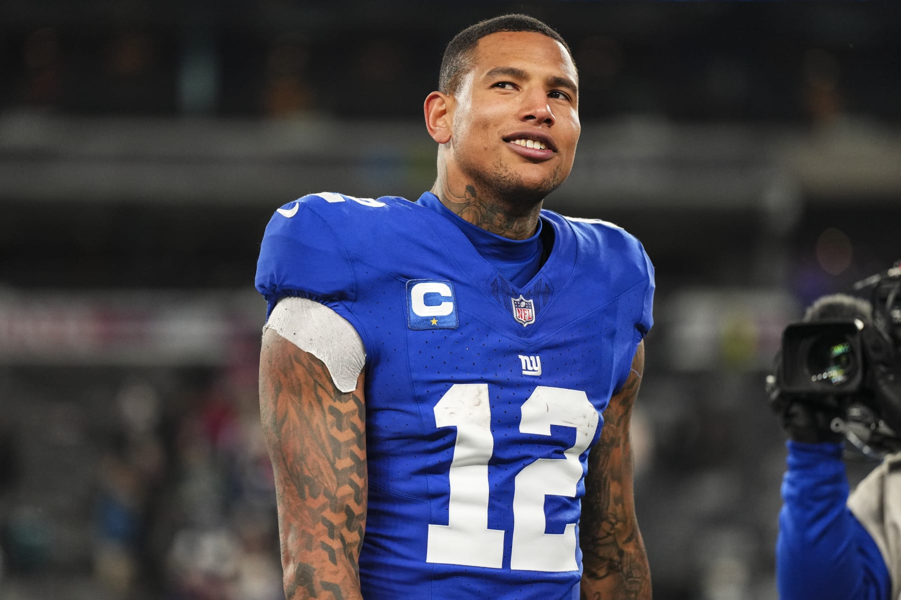 EAST RUTHERFORD, NJ - JANUARY 07: Darren Waller #12 of the New York Giants walks off of the field after an NFL football game against the Philadelphia Eagles at MetLife Stadium on January 7, 2024 in East Rutherford, New Jersey. (Photo by Cooper Neill/Getty Images)