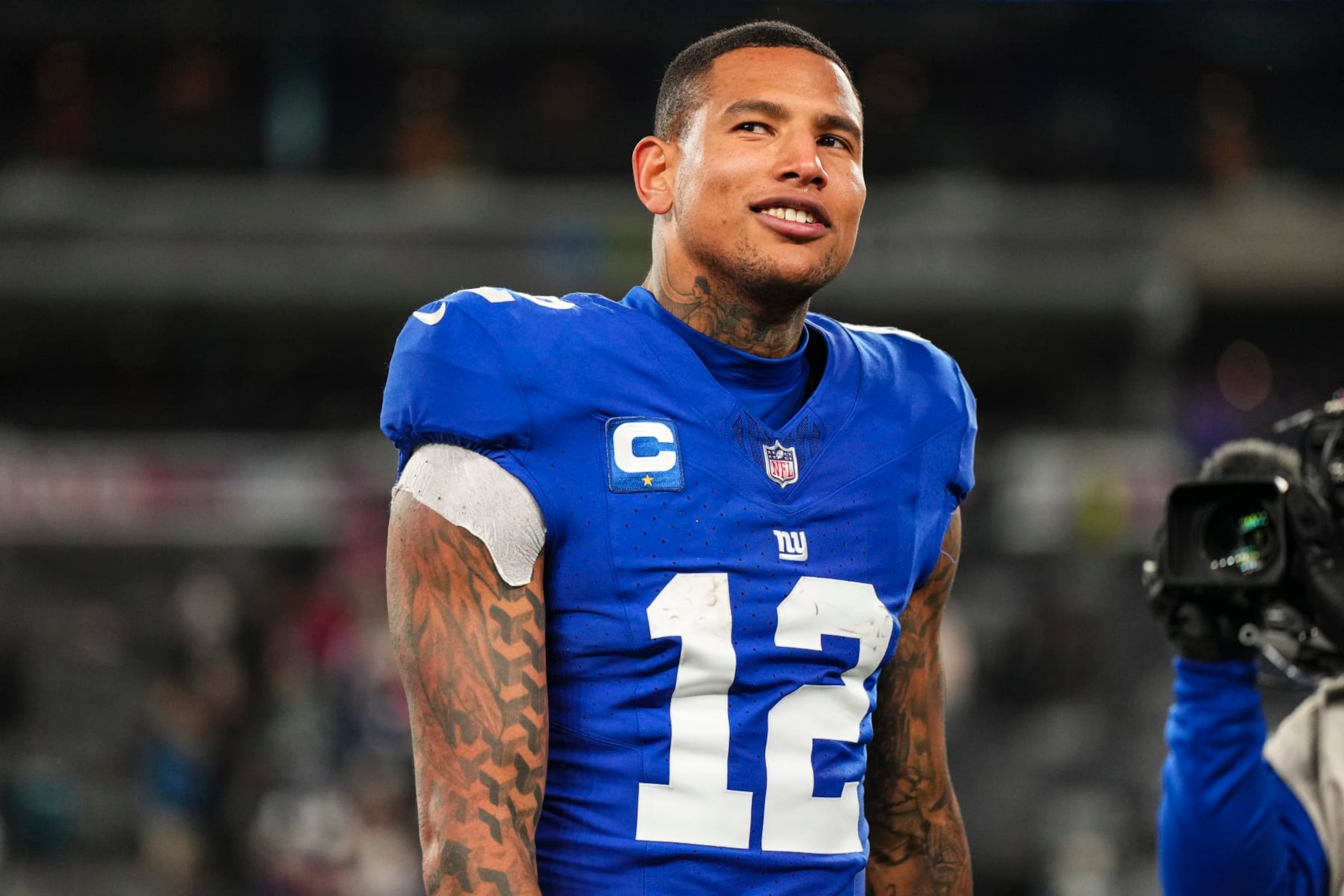 EAST RUTHERFORD, NJ - JANUARY 07: Darren Waller #12 of the New York Giants walks off of the field after an NFL football game against the Philadelphia Eagles at MetLife Stadium on January 7, 2024 in East Rutherford, New Jersey. (Photo by Cooper Neill/Getty Images)