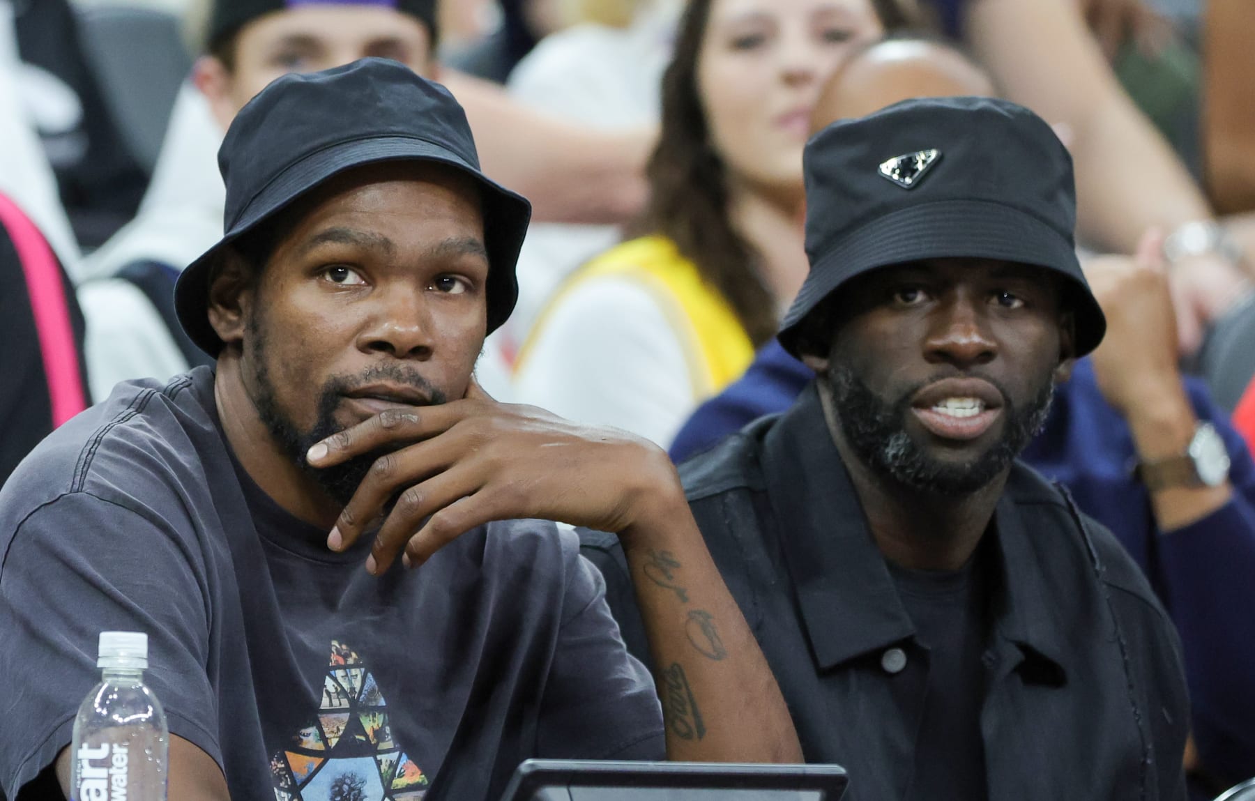 LAS VEGAS, NEVADA - AUGUST 07: NBA players Kevin Durant (L) and Draymond Green attend a 2023 FIBA World Cup exhibition game between Puerto Rico and the United States at T-Mobile Arena on August 07, 2023 in Las Vegas, Nevada. The United States defeated Puerto Rico 117-74. (Photo by Ethan Miller/Getty Images)