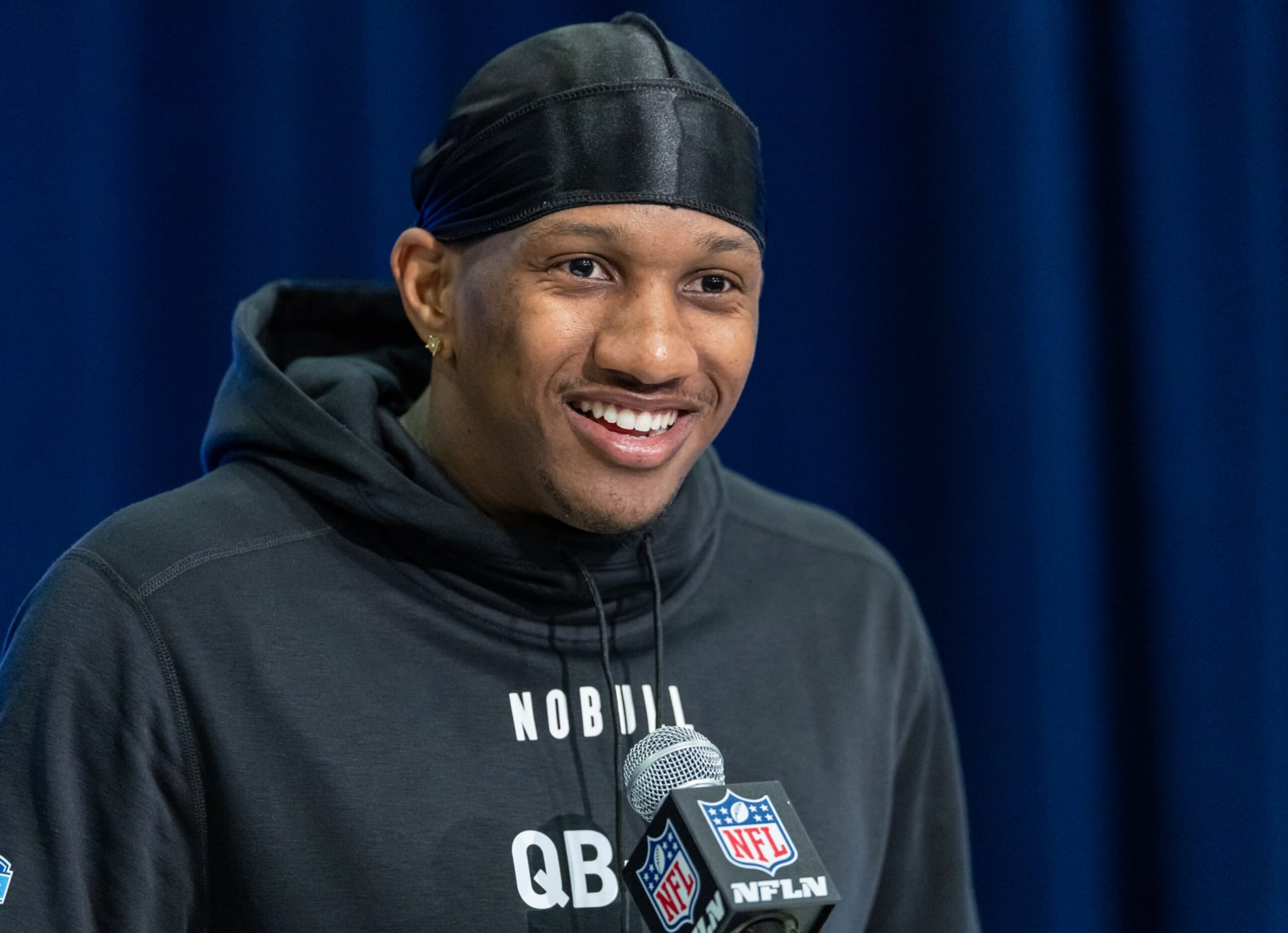 INDIANAPOLIS, INDIANA - MARCH 01: Michael Penix #QB08 of the Washington Huskies speaks to the media during the 2024 NFL Draft Combine at Lucas Oil Stadium on March 01, 2024 in Indianapolis, Indiana. (Photo by Michael Hickey/Getty Images)