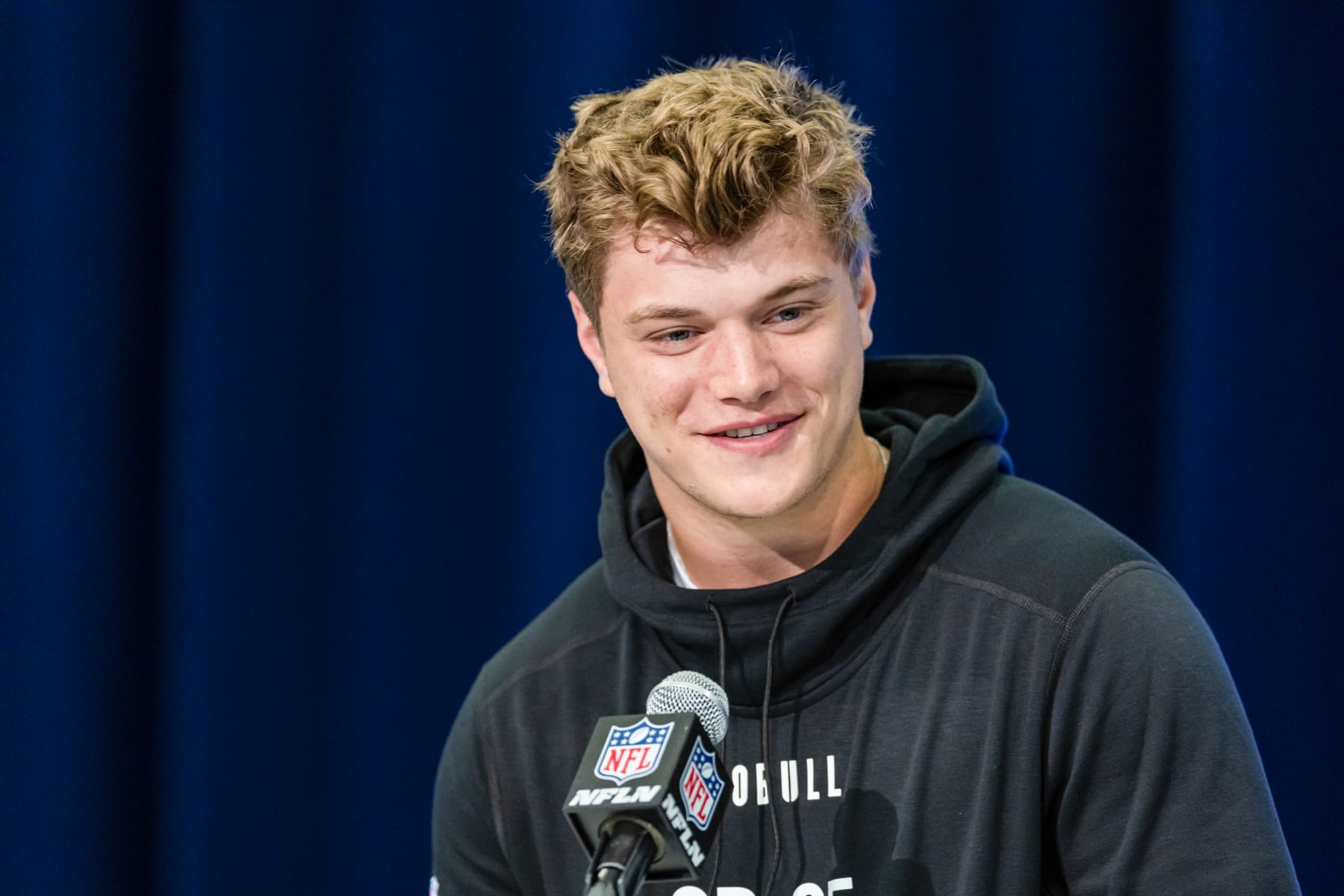 INDIANAPOLIS, INDIANA - MARCH 01: JJ McCarthy #QB05 of the Michigan Wolverines speaks to the media during the 2024 NFL Draft Combine at Lucas Oil Stadium on March 01, 2024 in Indianapolis, Indiana. (Photo by Michael Hickey/Getty Images)