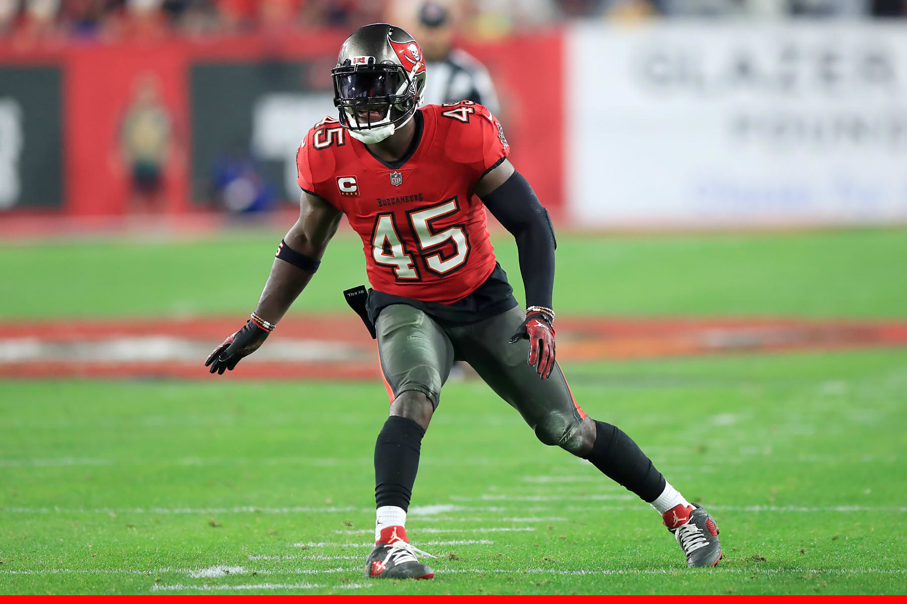 TAMPA, FL - JANUARY 15: Tampa Bay Buccaneers Linebacker Devin White (45) drops back into coverage during the NFC Wild Card game between the Philadelphia Eagles and the Tampa Bay Buccaneers on January 15, 2024 at Raymond James Stadium in Tampa, Florida. (Photo by Cliff Welch/Icon Sportswire via Getty Images)