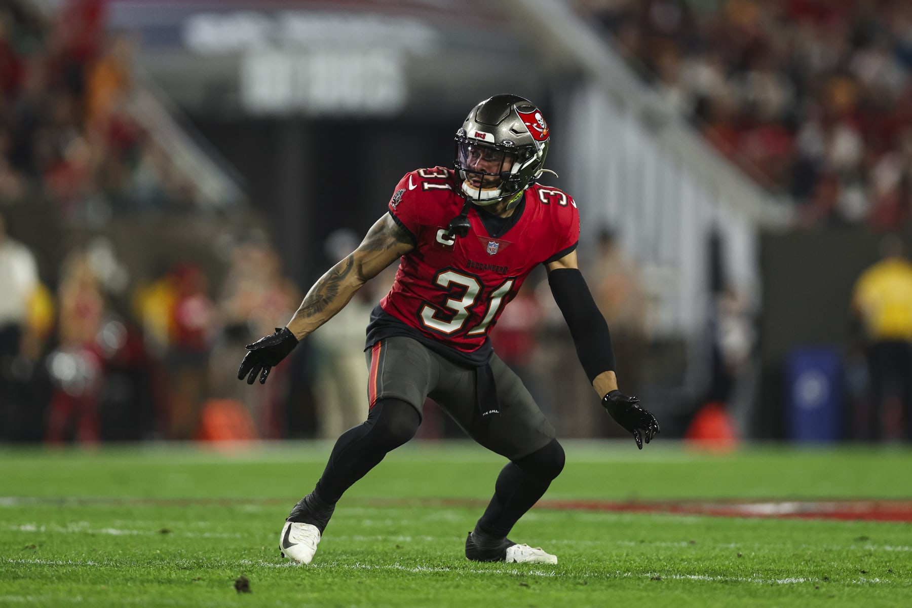 TAMPA, FL - JANUARY 15: Antoine Winfield Jr. #31 of the Tampa Bay Buccaneers defends in coverage during an NFL Wild Card playoff football game against the Philadelphia Eagles at Raymond James Stadium on January 15, 2024 in Tampa, Florida. (Photo by Perry Knotts/Getty Images)
