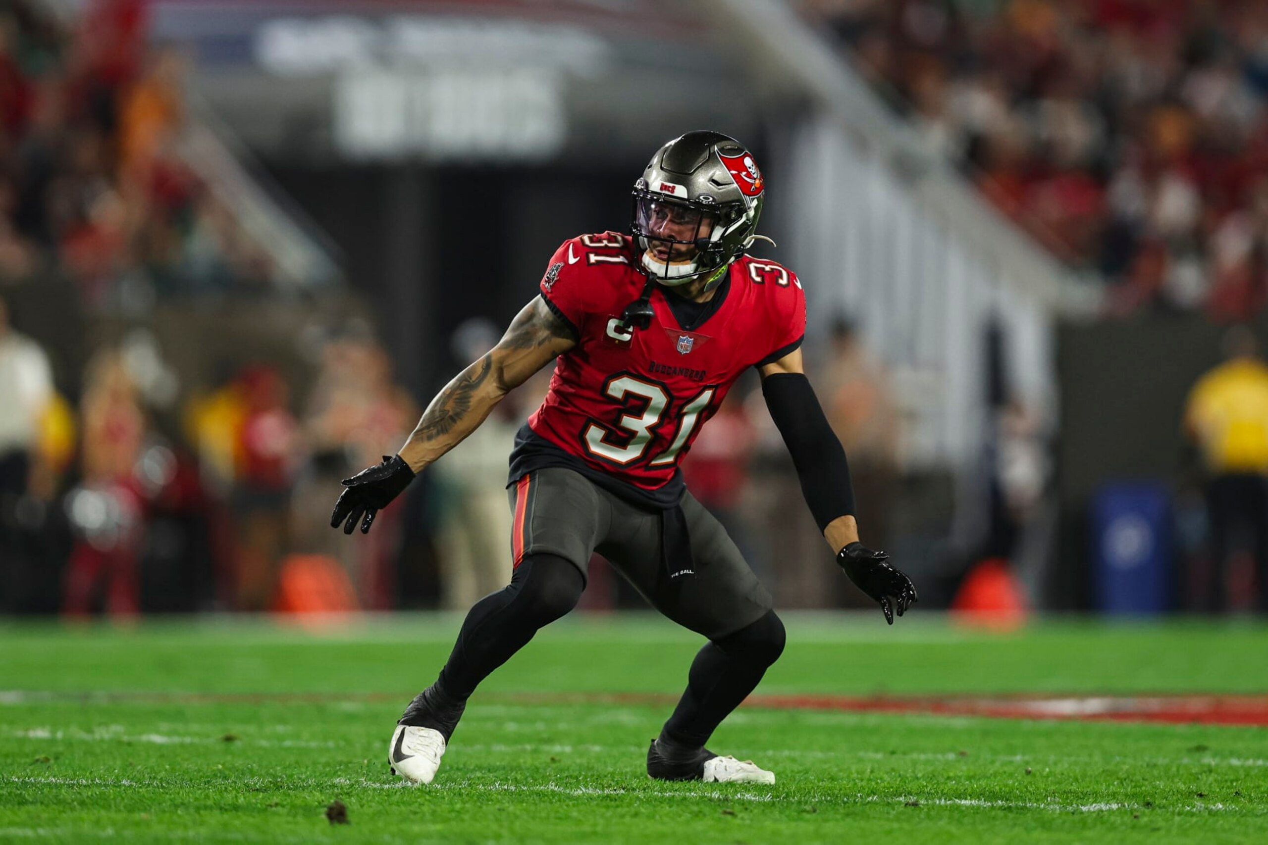 TAMPA, FL - JANUARY 15: Antoine Winfield Jr. #31 of the Tampa Bay Buccaneers defends in coverage during an NFL Wild Card playoff football game against the Philadelphia Eagles at Raymond James Stadium on January 15, 2024 in Tampa, Florida. (Photo by Perry Knotts/Getty Images)