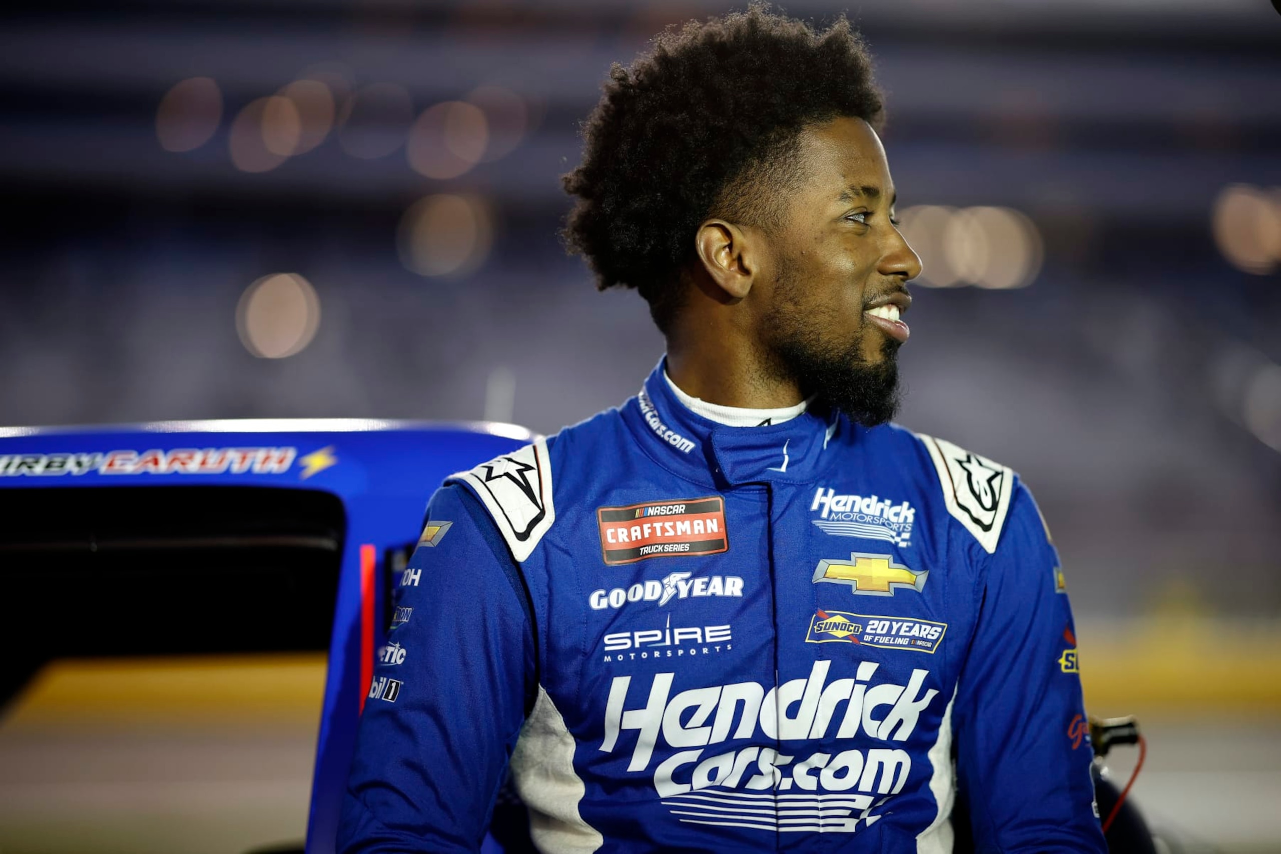 LAS VEGAS, NEVADA - MARCH 01: Rajah Caruth, driver of the #71 HendrickCars.com Chevrolet, waits on the grid prior to the NASCAR Craftsman Truck Series Victoria's Voice Foundation 200 at Las Vegas Motor Speedway on March 01, 2024 in Las Vegas, Nevada. (Photo by Chris Graythen/Getty Images) LAS VEGAS, NEVADA - MARCH 01: Rajah Caruth, driver of the #71 HendrickCars.com Chevrolet, waits on the grid prior to the NASCAR Craftsman Truck Series Victoria's Voice Foundation 200 at Las Vegas Motor Speedway on March 01, 2024 in Las Vegas, Nevada. (Photo by Chris Graythen/Getty Images)