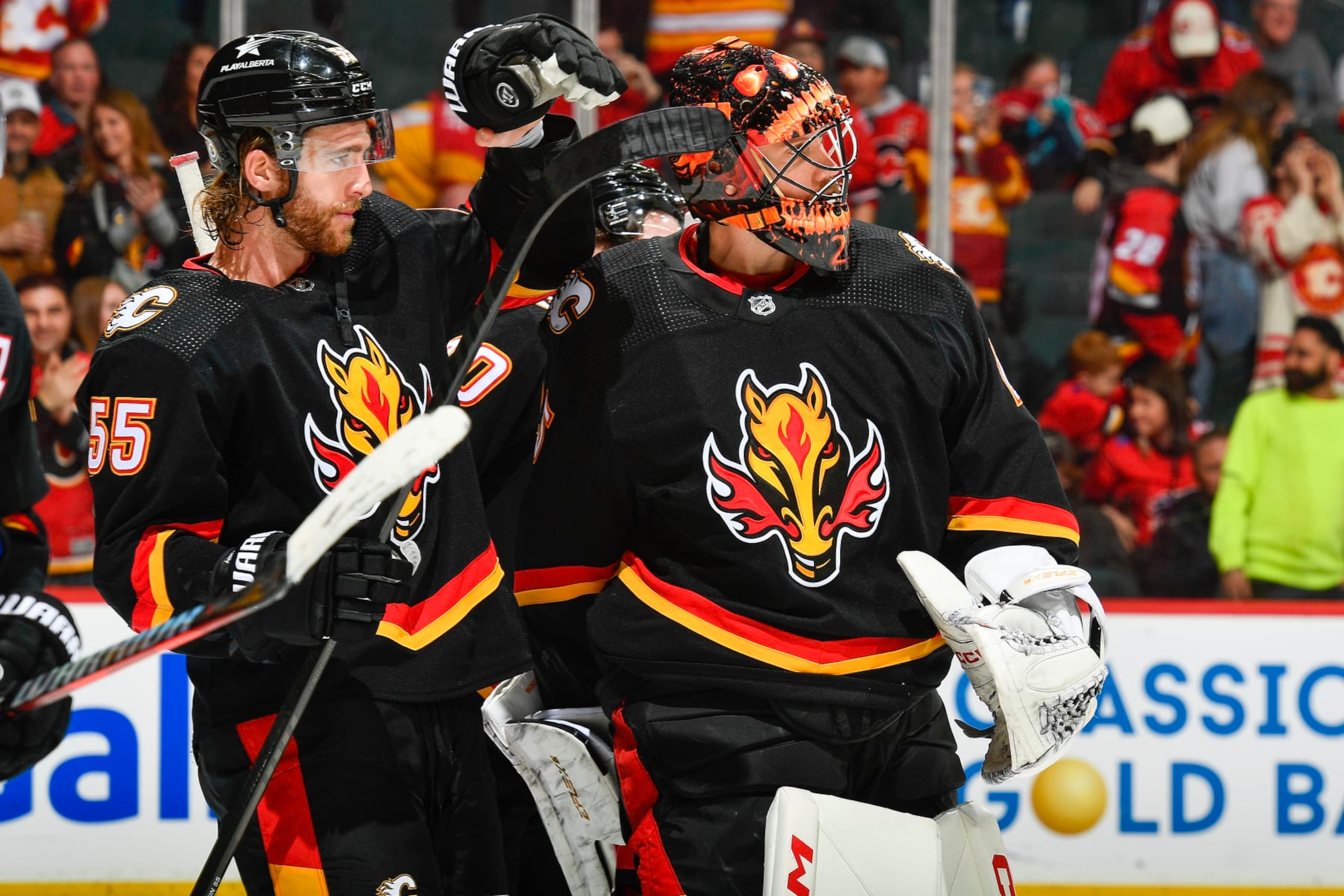 Noah Hanifin and Jacob Markstrom