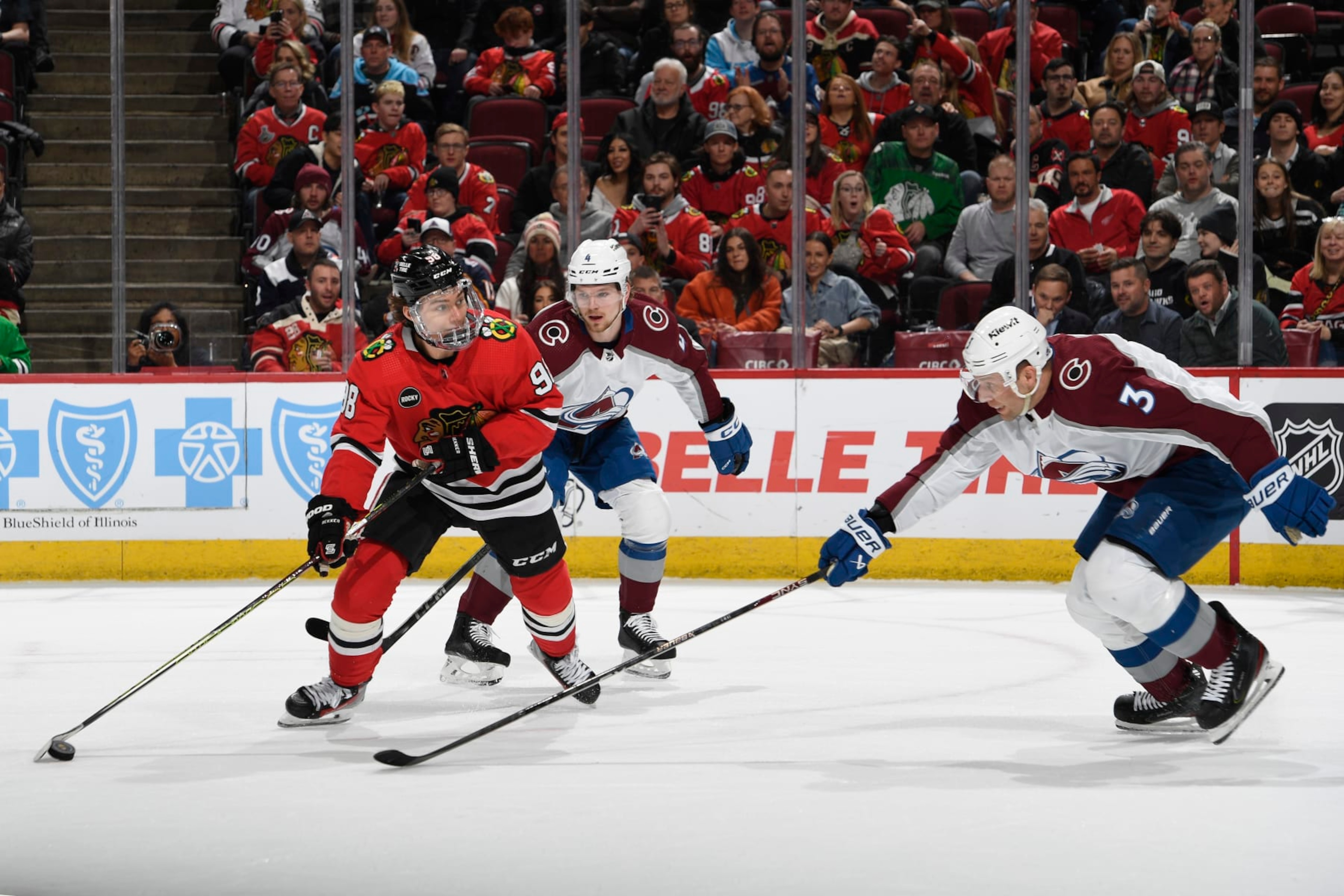CHICAGO, ILLINOIS - FEBRUARY 29: Connor Bedard #98 of the Chicago Blackhawks looks to shoot the puck against Jack Johnson #3 of the Colorado Avalanche in the first period at the United Center on February 29, 2024 in Chicago, Illinois. (Photo by Bill Smith/NHLI via Getty Images)