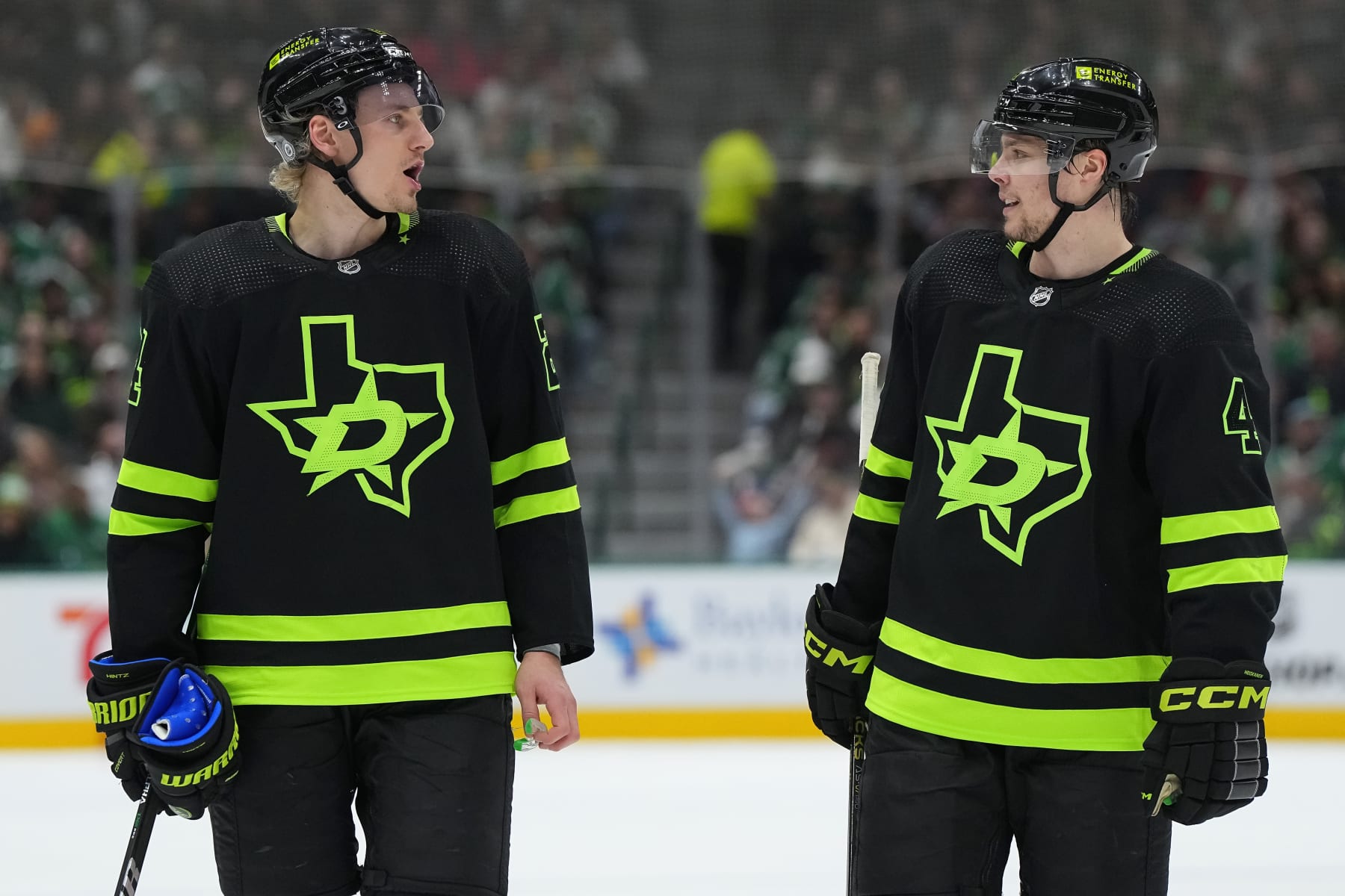 DALLAS, TEXAS - JANUARY 27: Roope Hintz #24 of the Dallas Stars and Miro Heiskanen #4 of the Dallas Stars talk during a first period timeout of the game against the Washington Capitals at American Airlines Center on January 27, 2024 in Dallas, Texas. (Photo by Sam Hodde/Getty Images)