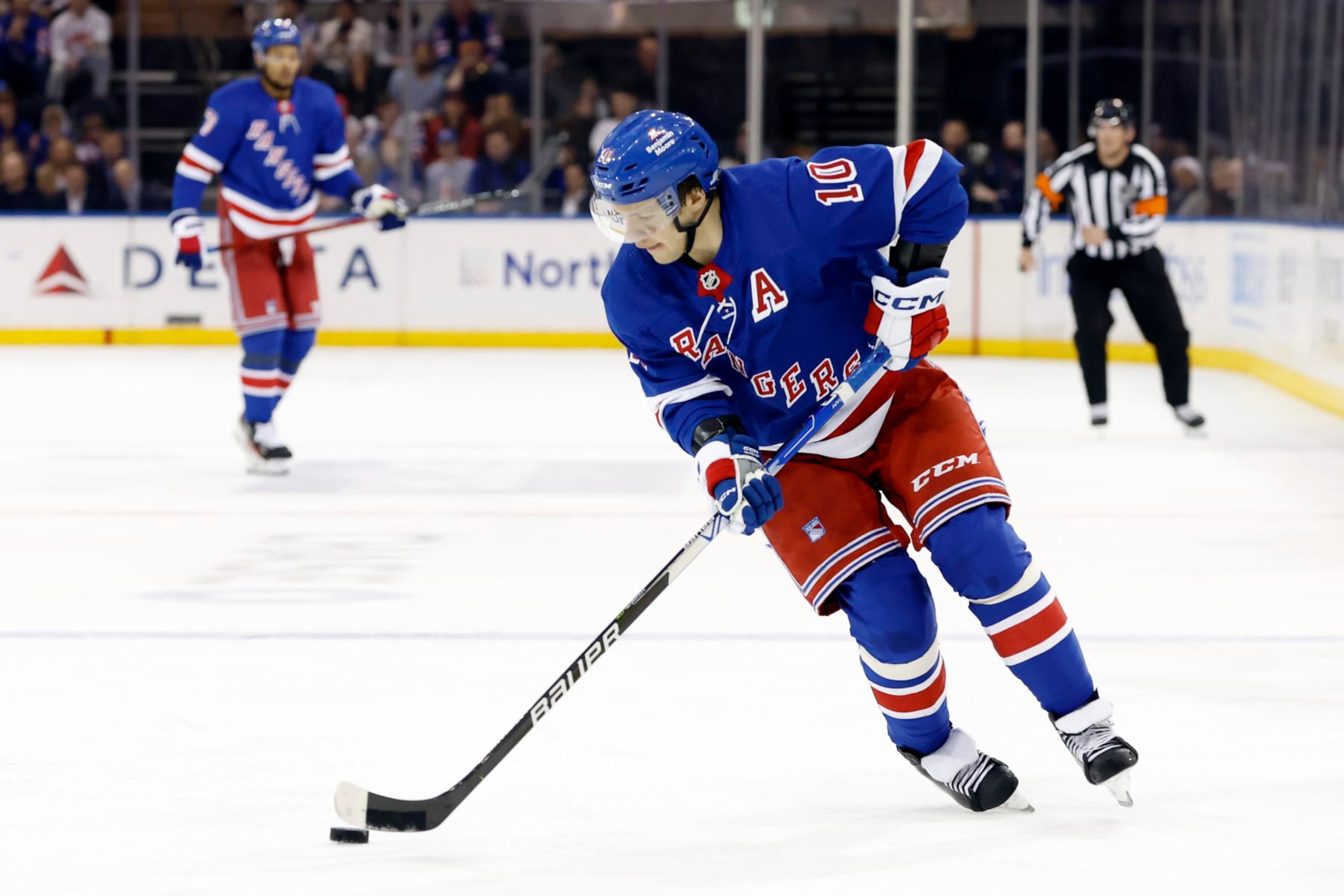 NEW YORK, NEW YORK - FEBRUARY 28: Artemi Panarin #10 of the New York Rangers controls the puck during the second period against the Columbus Blue Jackets at Madison Square Garden on February 28, 2024 in New York City. (Photo by Sarah Stier/Getty Images)