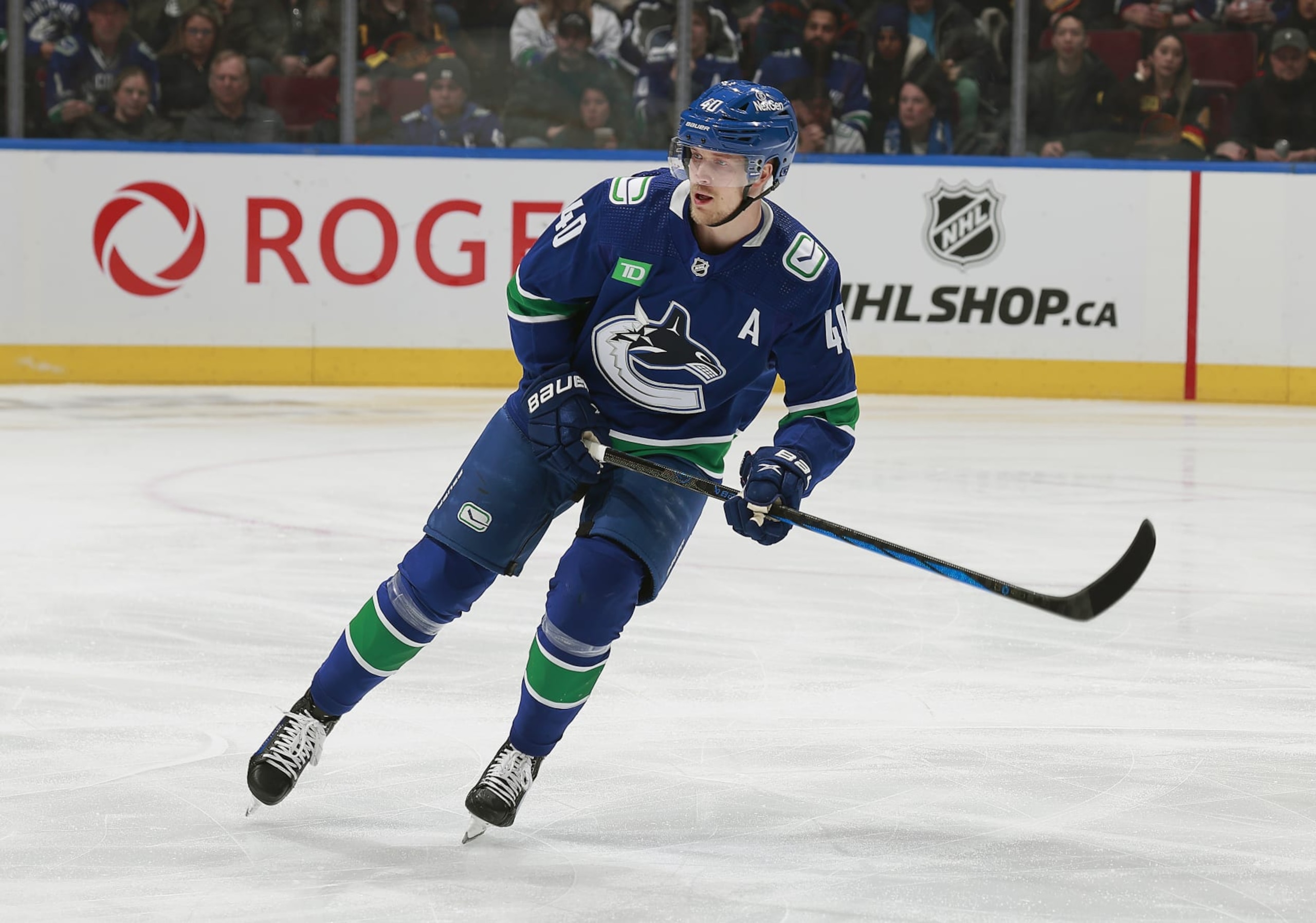 VANCOUVER, CANADA - FEBRUARY 17: Elias Pettersson #40 of the Vancouver Canucks skates up ice during their NHL game against the Winnipeg Jets at Rogers Arena on February 17, 2024 in Vancouver, British Columbia, Canada.  (Photo by Jeff Vinnick/NHLI via Getty Images)