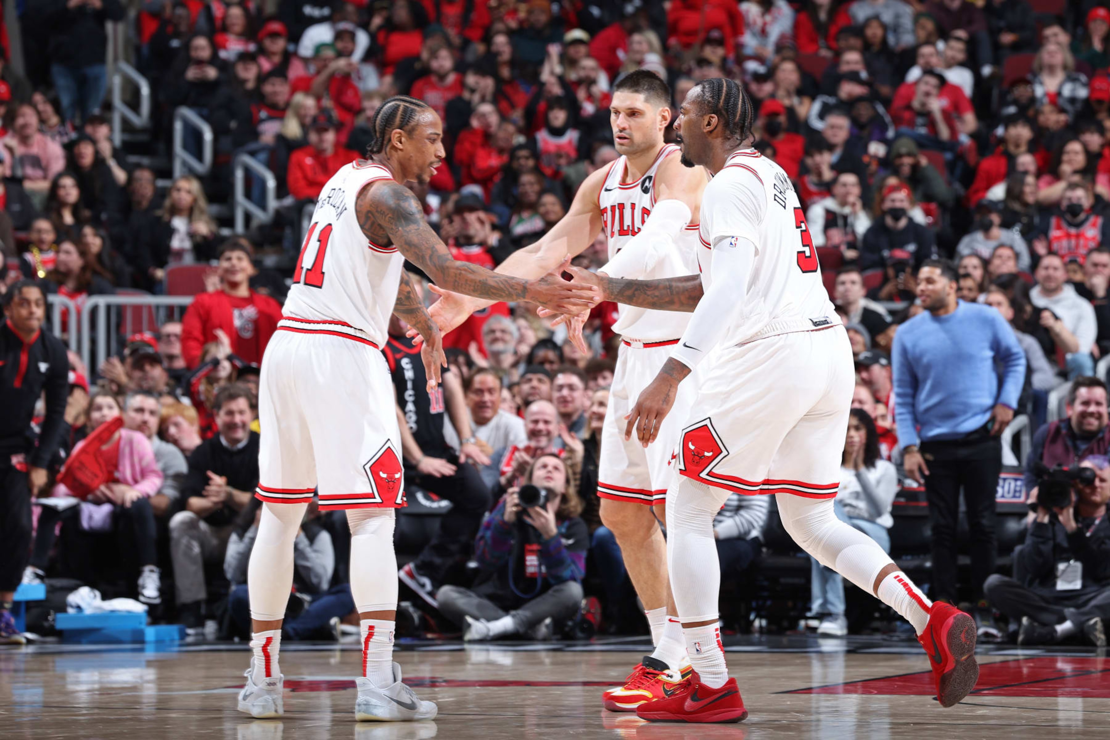 DeMar DeRozan, Nikola VuÄeviÄ and Andre Drummond