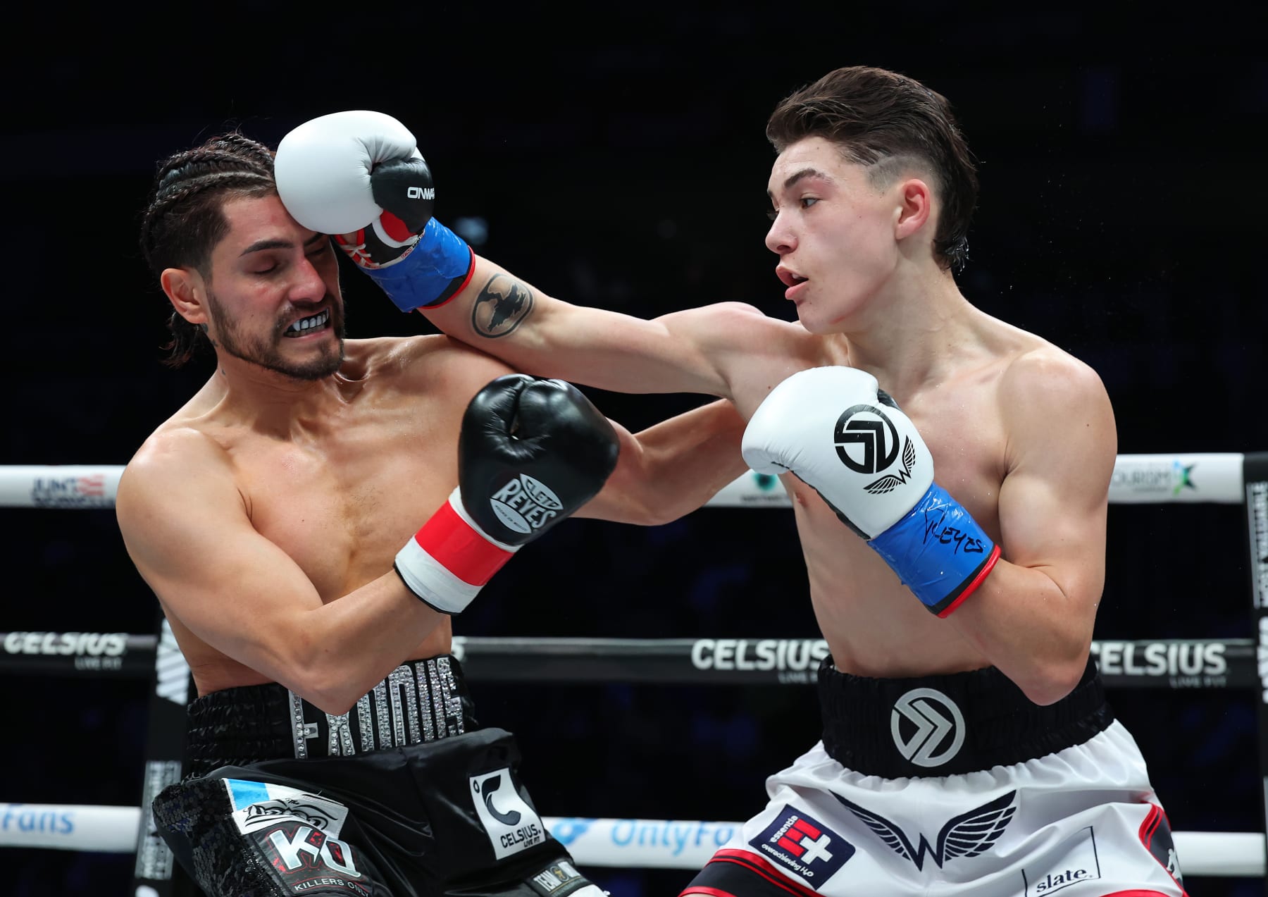 HATO REY, PUERTO RICO - MARCH 02:  Javon Walton punches Joshua Torres during their featherweight fight at Coliseo de Puerto Rico on March 02, 2024 in Hato Rey, Puerto Rico.  (Photo by Al Bello/Getty Images)