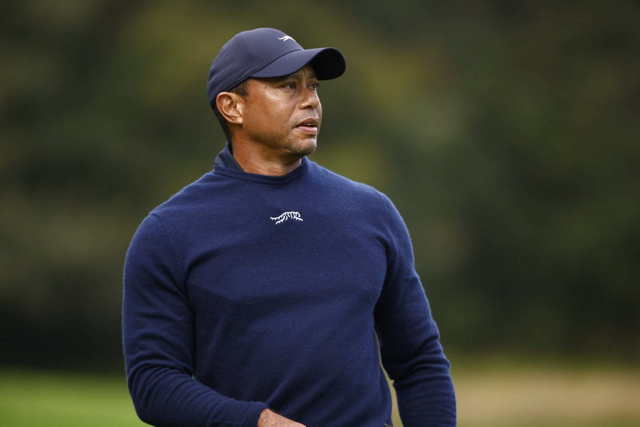 PACIFIC PALISADES, CALIFORNIA - FEBRUARY 16: Tiger Woods of the United States reacts to his shot from the sixth tee during the second round of The Genesis Invitational at Riviera Country Club on February 16, 2024 in Pacific Palisades, California. (Photo by Ronald Martinez/Getty Images)