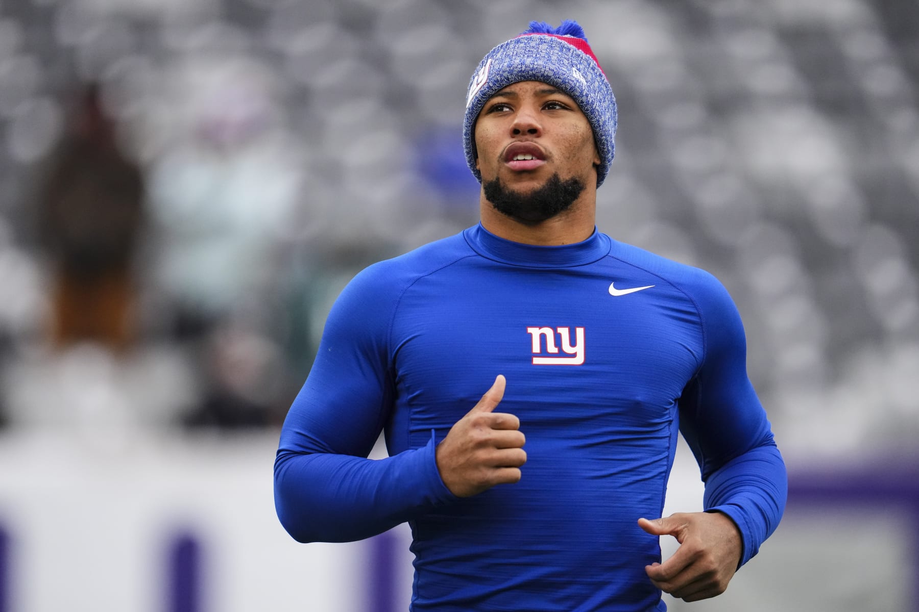 EAST RUTHERFORD, NJ - JANUARY 07: Saquon Barkley #26 of the New York Giants warms up prior to an NFL football game against the Philadelphia Eagles at MetLife Stadium on January 7, 2024 in East Rutherford, New Jersey. (Photo by Cooper Neill/Getty Images)