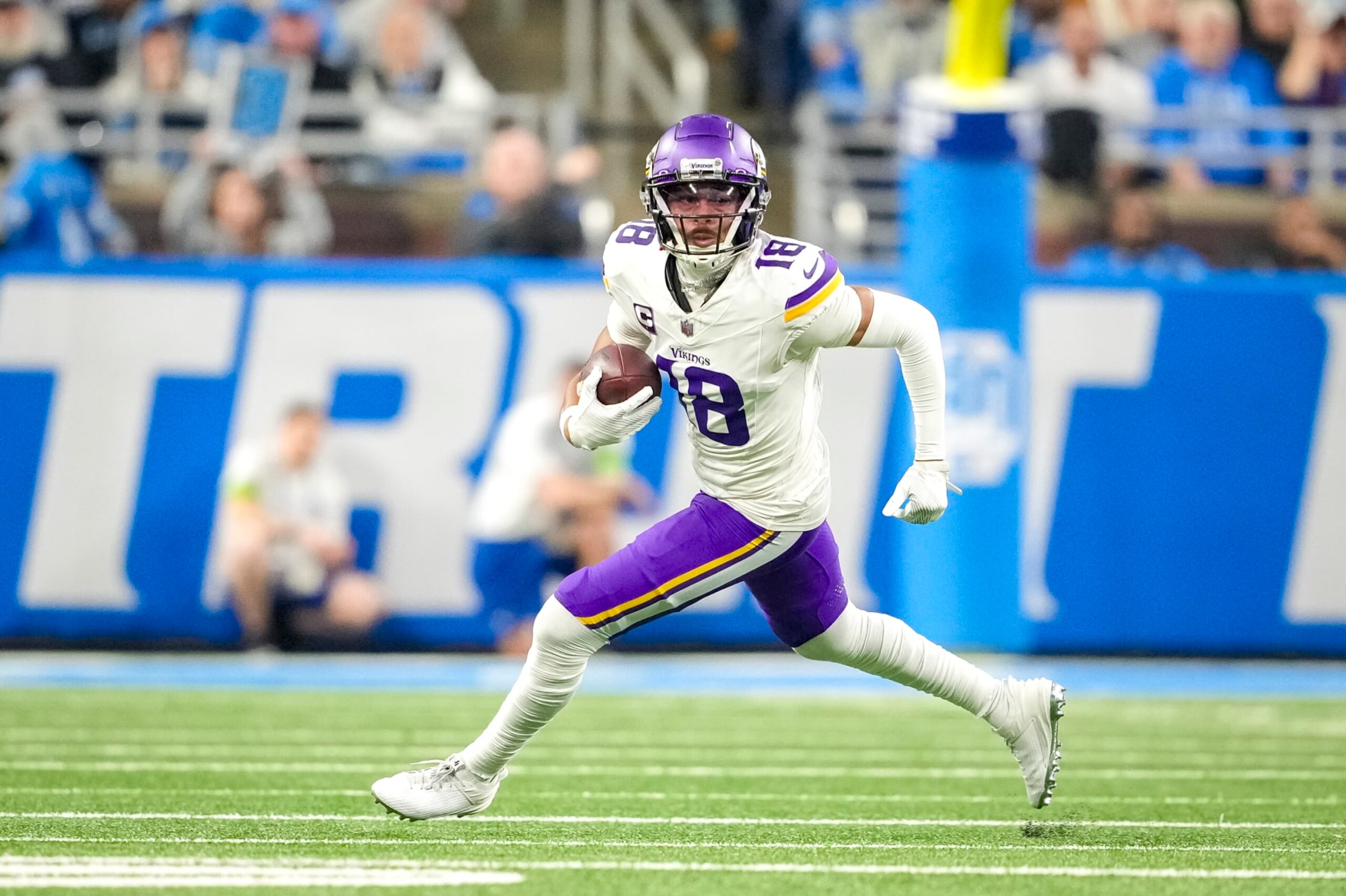 DETROIT, MICHIGAN - JANUARY 07: Justin Jefferson #18 of the Minnesota Vikings runs the ball against the Detroit Lions at Ford Field on January 07, 2024 in Detroit, Michigan. (Photo by Nic Antaya/Getty Images) DETROIT, MICHIGAN - JANUARY 07: Justin Jefferson #18 of the Minnesota Vikings runs the ball against the Detroit Lions at Ford Field on January 07, 2024 in Detroit, Michigan. (Photo by Nic Antaya/Getty Images)