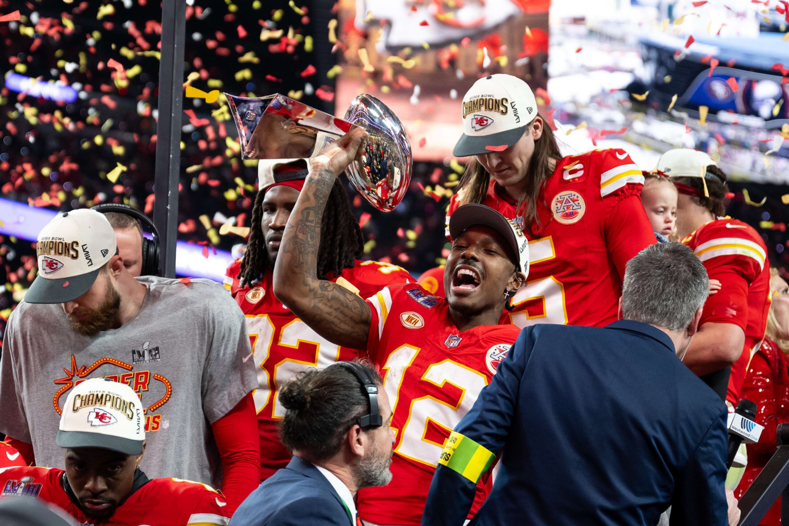 LAS VEGAS, NEVADA - FEBRUARY 11: Wide receiver Mecole Hardman Jr. #12 of the Kansas City Chiefs lifts the Lombardi trophy after Super Bowl LVIII against the San Francisco 49ers at Allegiant Stadium on February 11, 2024 in Las Vegas, Nevada. (Photo by Luke Hales/Getty Images)
