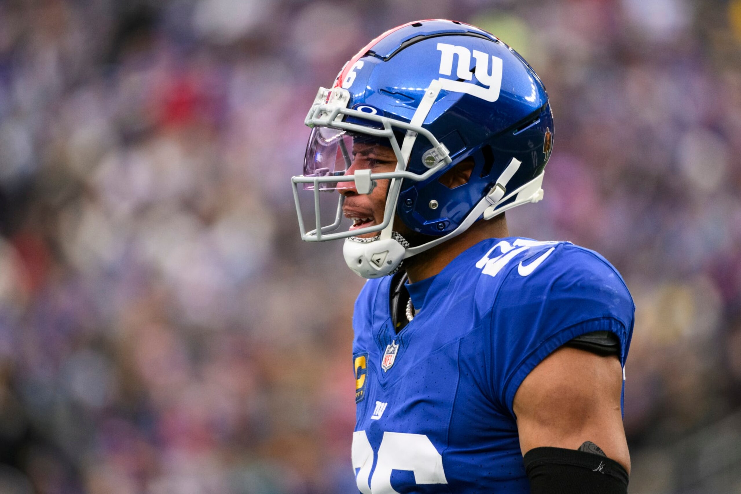 EAST RUTHERFORD, NEW JERSEY - DECEMBER 31:  Saquon Barkley #26 of the New York Giants reacts to a play during the first half against the Los Angeles Rams at MetLife Stadium on December 31, 2023 in East Rutherford, New Jersey. (Photo by Mike Lawrence/Getty Images)
