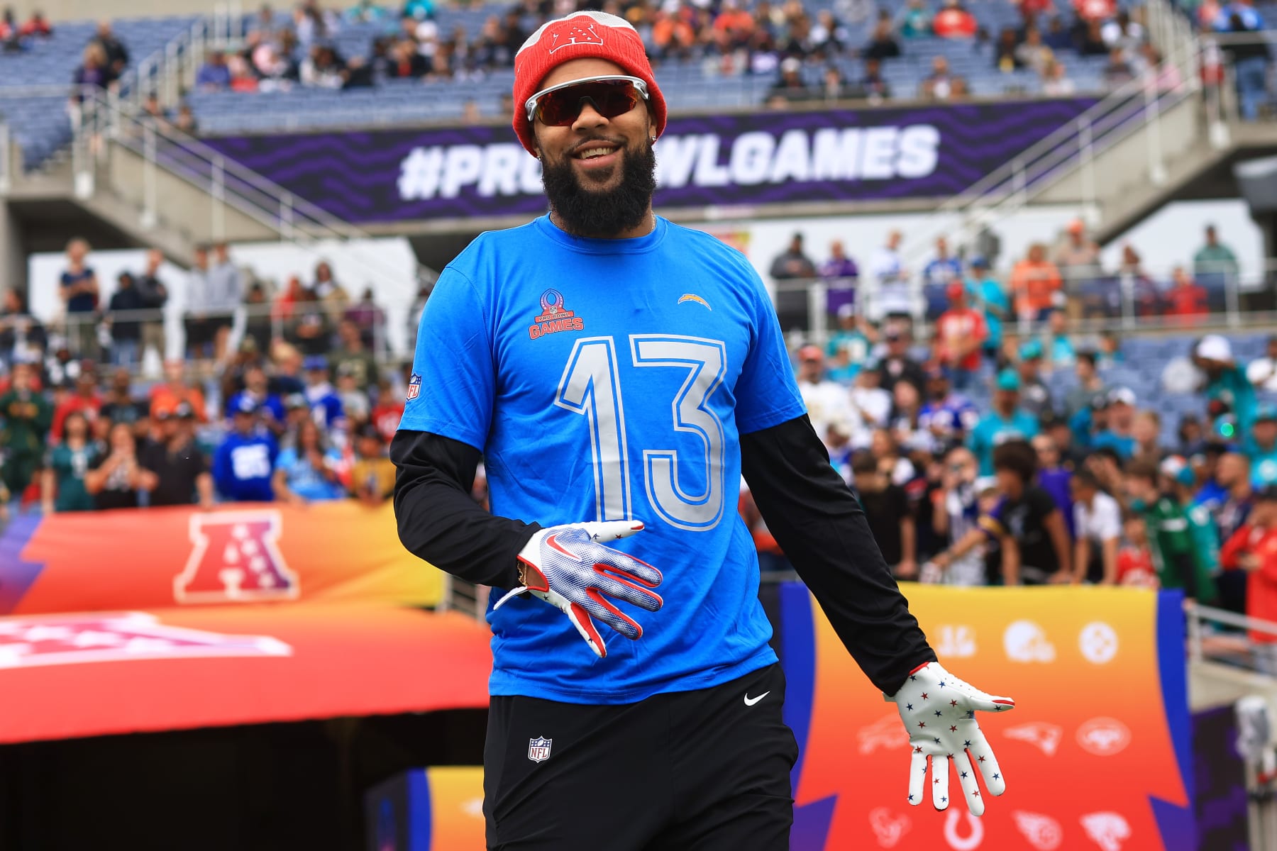ORLANDO, FLORIDA - FEBRUARY 04: Keenan Allen #13 of the Los Angeles Chargers and AFC reacts as he runs onto the field prior to the 2024 NFL Pro Bowl Games at Camping World Stadium on February 04, 2024 in Orlando, Florida. (Photo by Mike Ehrmann/Getty Images)