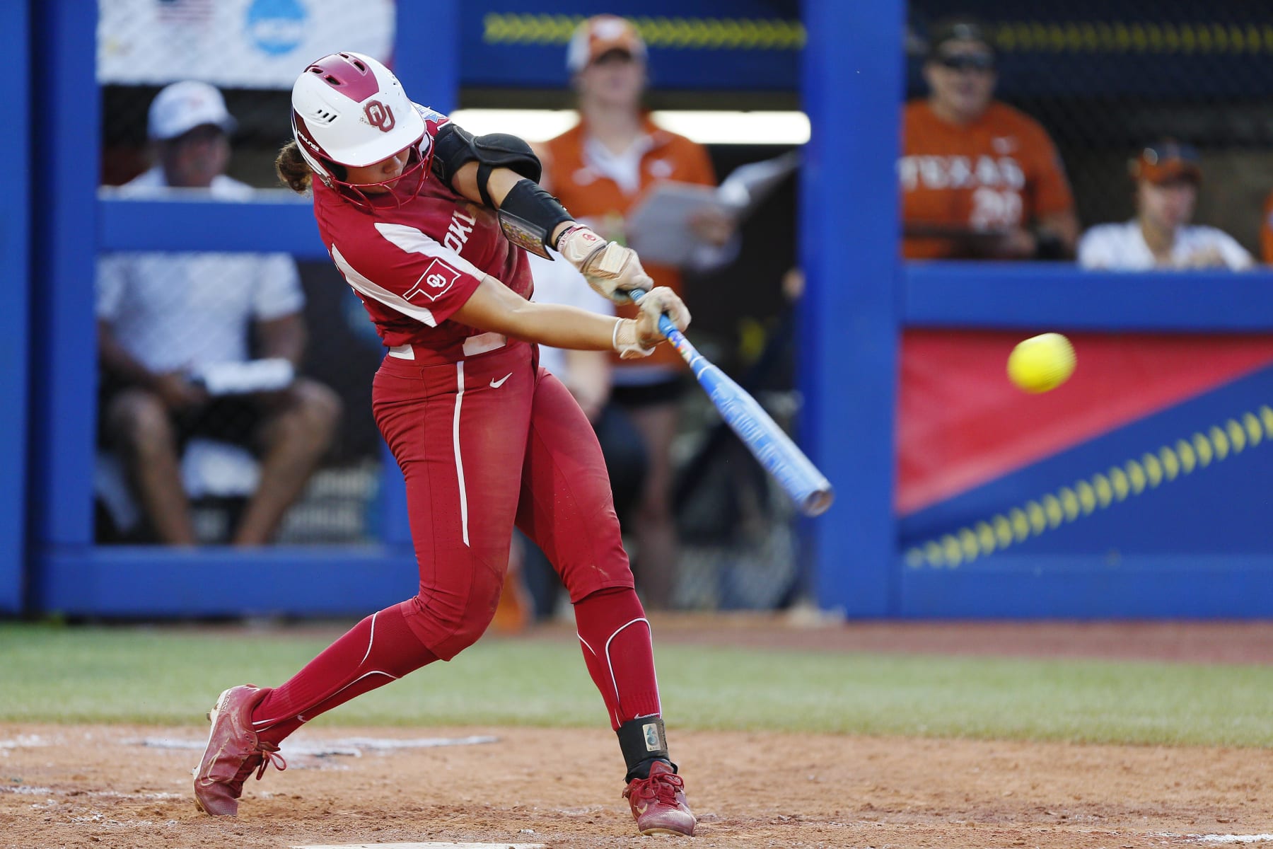 OKLAHOMA CITY, OK - JUNE 9:  Alyssa Brito #33 of the Oklahoma Sooners hits an RBI double against the Texas Longhorns in the fifth inning to take a lead during the NCAA Women's College World Series finals at the USA Softball Hall of Fame Complex on June 9, 2022 in Oklahoma City, Oklahoma.  Oklahoma won the NCAA Championship with a 10-5 victory.  (Photo by Brian Bahr/Getty Images)