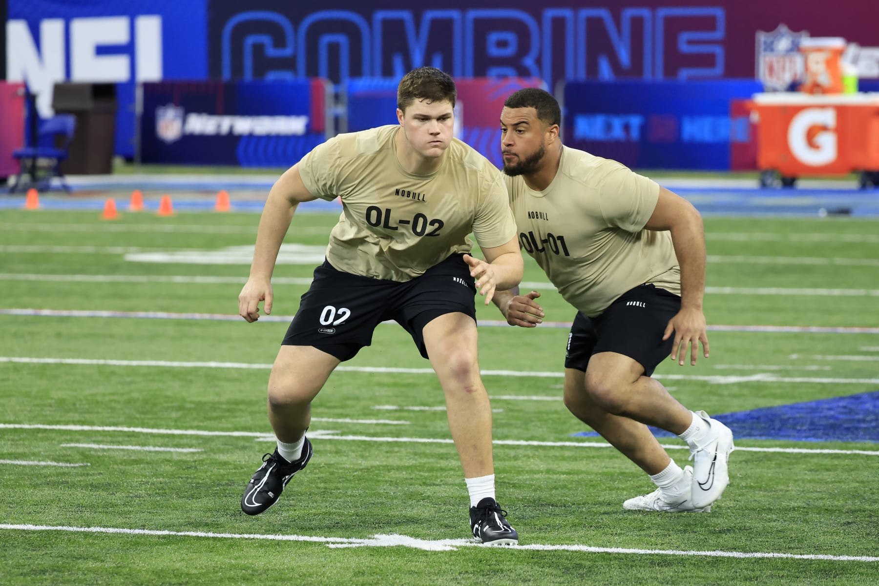 INDIANAPOLIS, INDIANA - MARCH 03: Joe Alt #OL02 of Notre Dame and Isaiah Adams #OL01 of Illinois participate in a drill during the NFL Combine at Lucas Oil Stadium on March 03, 2024 in Indianapolis, Indiana. (Photo by Justin Casterline/Getty Images)