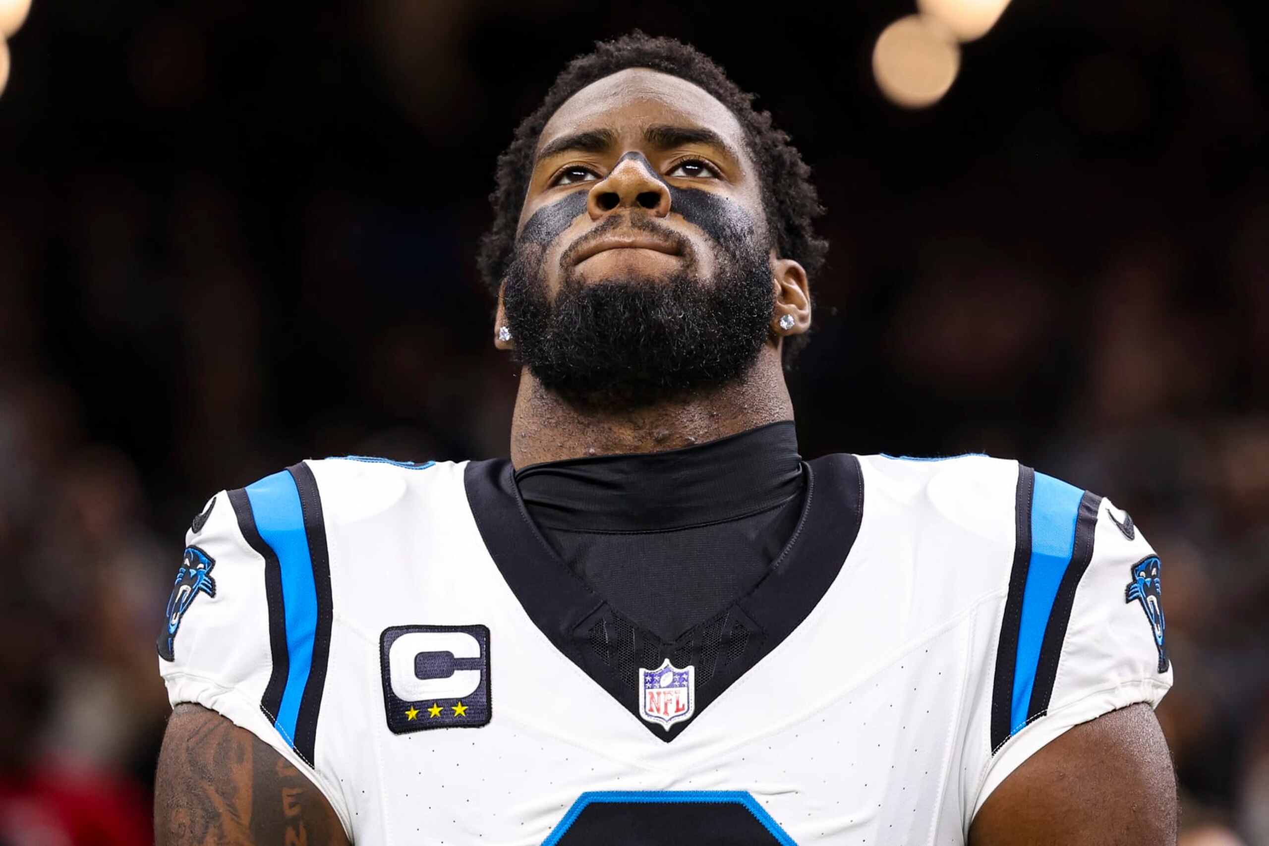 NEW ORLEANS, LA - DECEMBER 10: Brian Burns #0 of the Carolina Panthers looks on from the sideline during the national anthem prior to an NFL football game against the New Orleans Saints at Caesars Superdome on December 10, 2023 in New Orleans, LA. (Photo by Perry Knotts/Getty Images)