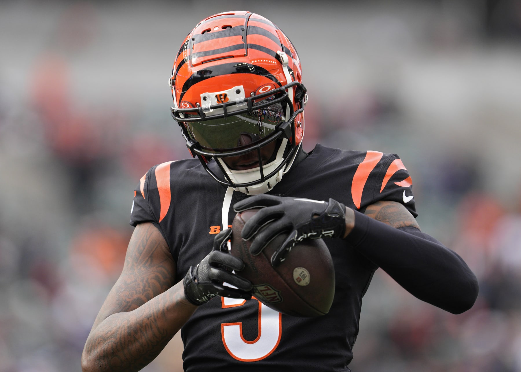 CINCINNATI, OHIO - DECEMBER 16: Tee Higgins #5 of the Cincinnati Bengals warms up prior to a NFL football game against the Minnesota Vikings at Paycor Stadium on December 16, 2023 in Cincinnati, Ohio. (Photo by Jeff Dean/Getty Images)