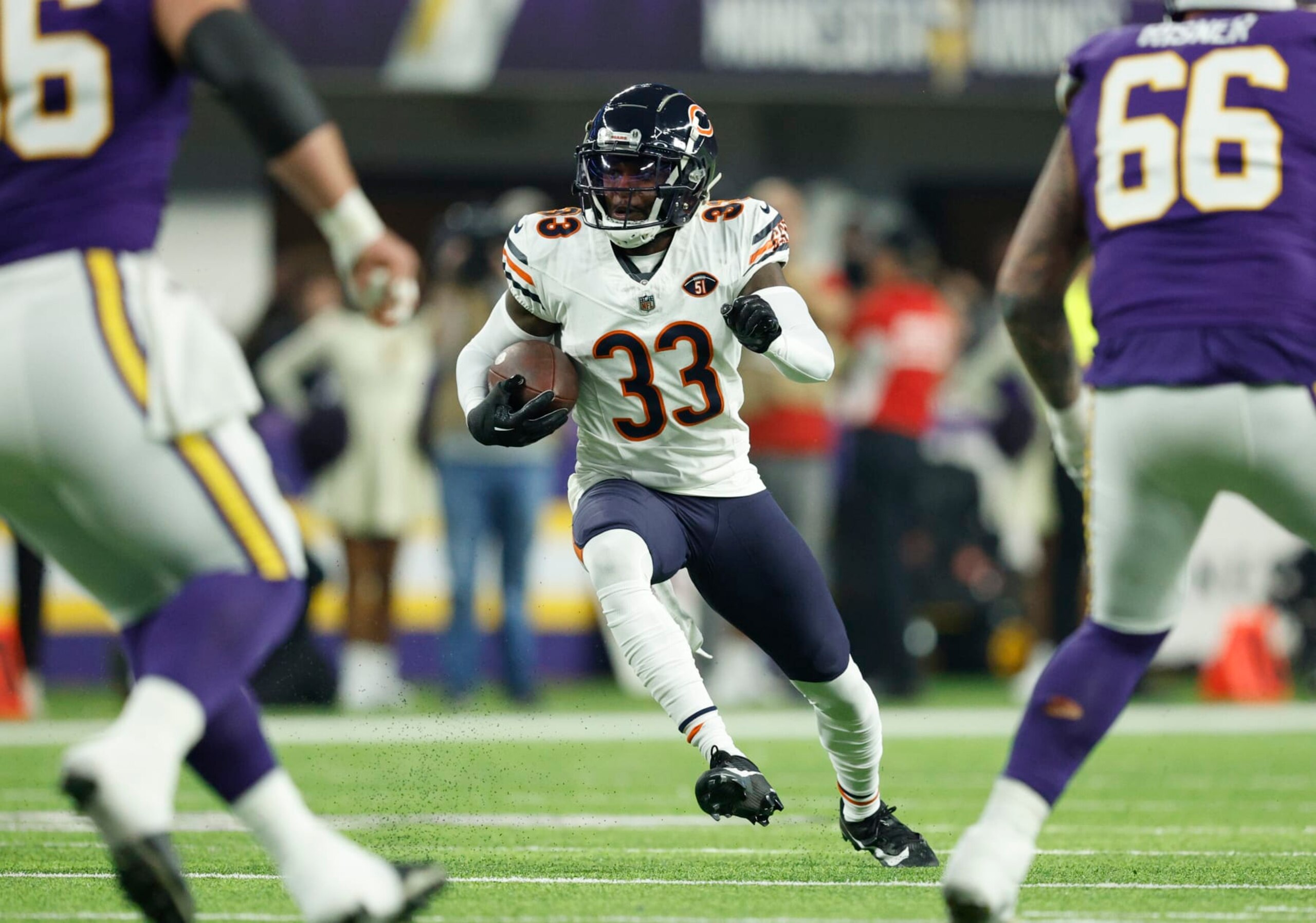 MINNEAPOLIS, MINNESOTA - NOVEMBER 27: Jaylon Johnson #33 of the Chicago Bears runs after intercepting a pass during the second quarter against the Minnesota Vikings at U.S. Bank Stadium on November 27, 2023 in Minneapolis, Minnesota. (Photo by David Berding/Getty Images)