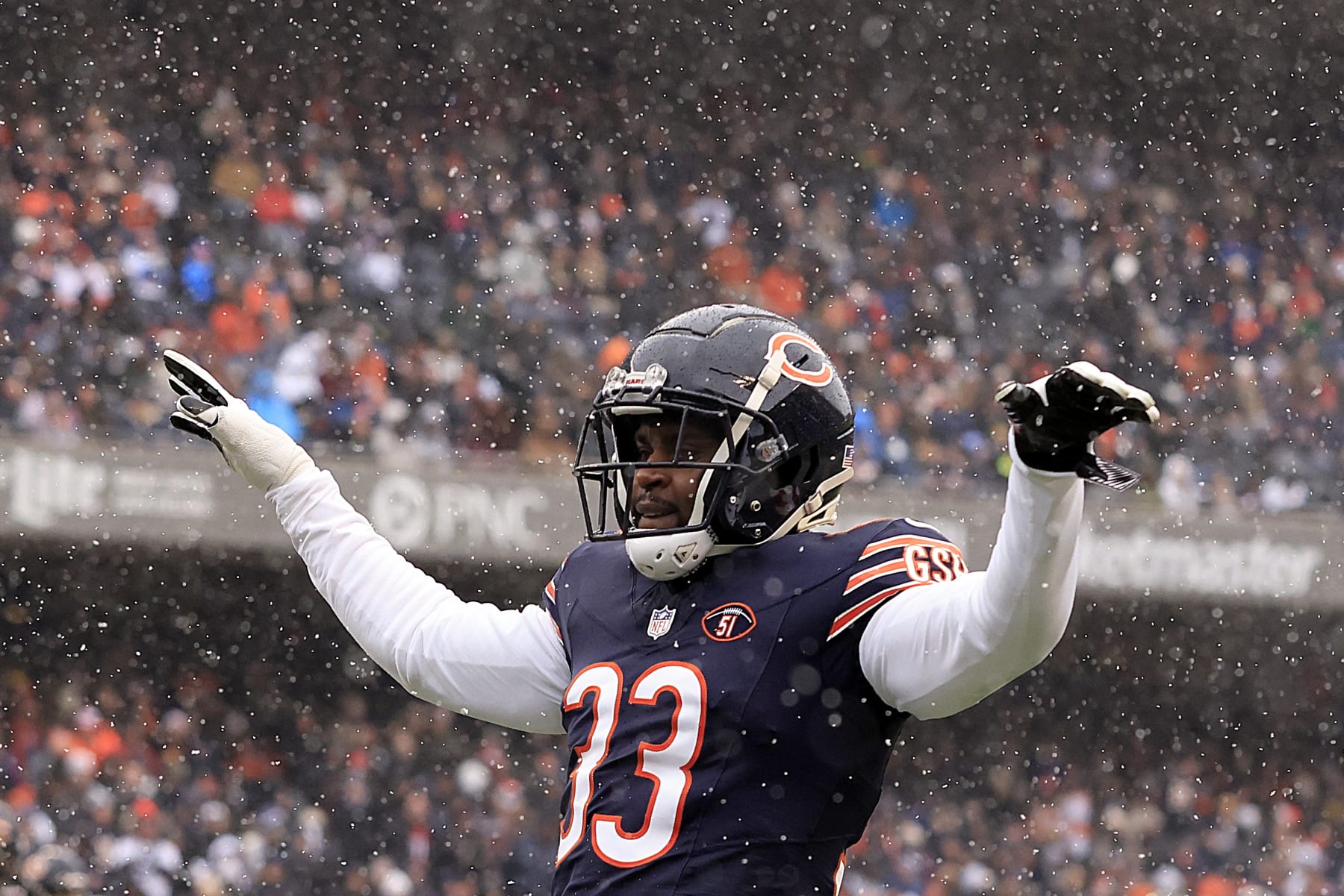 CHICAGO, ILLINOIS - DECEMBER 31: Jaylon Johnson #33 of the Chicago Bears celebrates after a play during the first half against the Atlanta Falcons at Soldier Field on December 31, 2023 in Chicago, Illinois. (Photo by Justin Casterline/Getty Images)