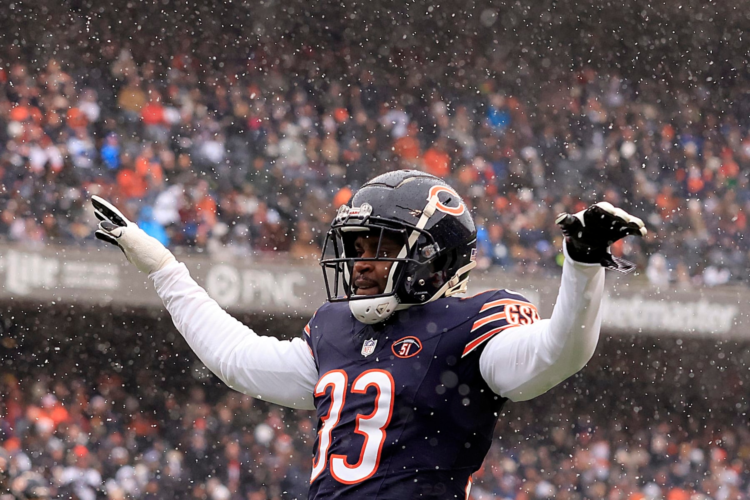 CHICAGO, ILLINOIS - DECEMBER 31: Jaylon Johnson #33 of the Chicago Bears celebrates after a play during the first half against the Atlanta Falcons at Soldier Field on December 31, 2023 in Chicago, Illinois. (Photo by Justin Casterline/Getty Images)