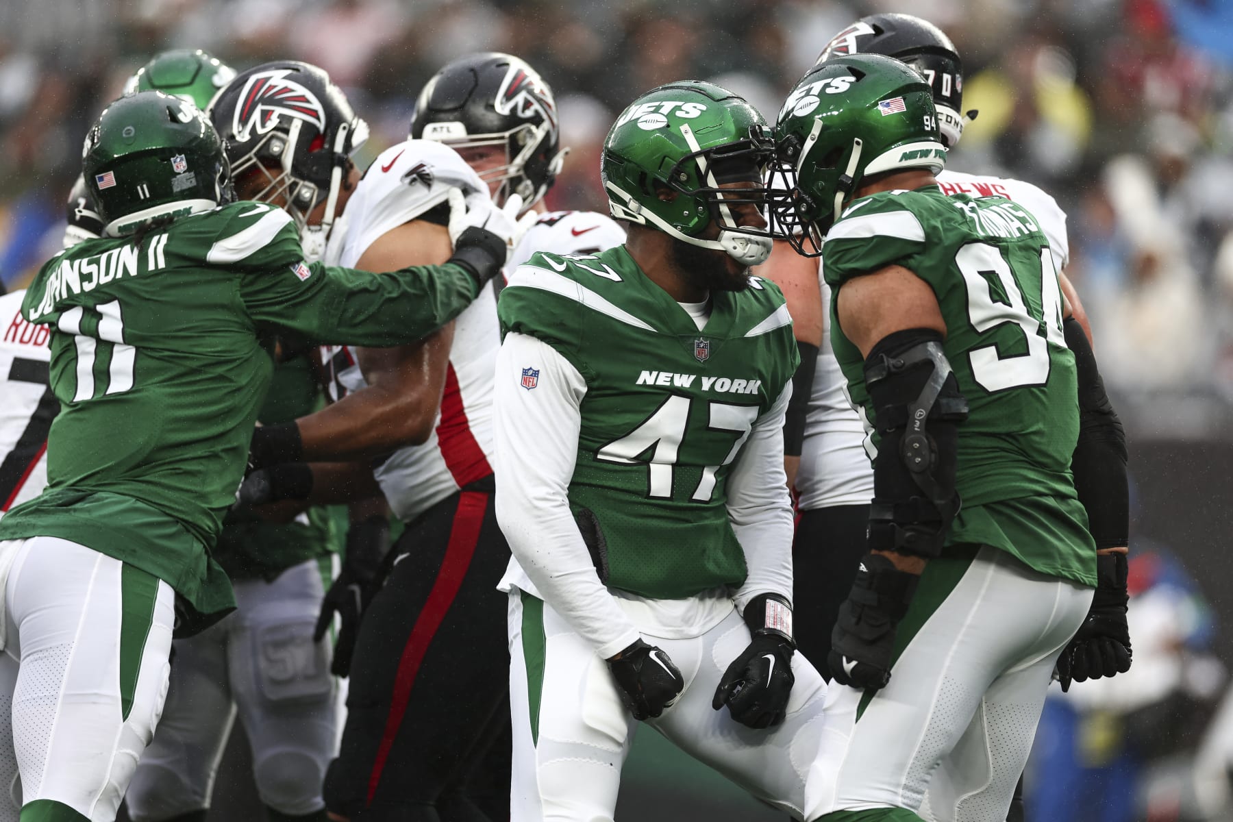EAST RUTHERFORD, NJ - DECEMBER 3: Bryce Huff #47 of the New York Jets celebrates with Solomon Thomas #94 after a play during the second quarter of an NFL football game against the Atlanta Falcons at MetLife Stadium on December 3, 2023 in East Rutherford, New Jersey. (Photo by Kevin Sabitus/Getty Images)