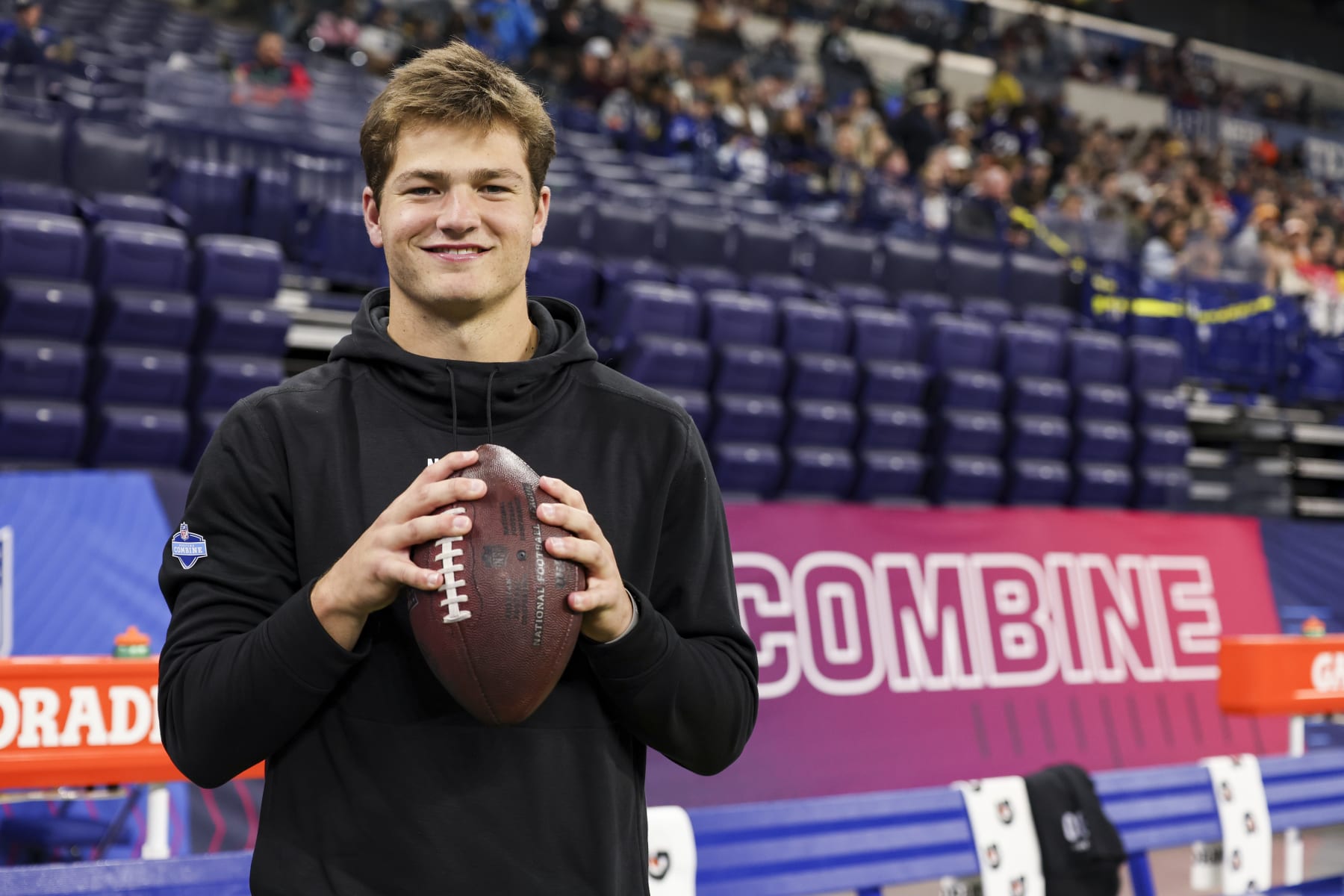 INDIANAPOLIS, INDIANA - MARCH 2: Drake Maye #QB04 of North Carolina holds a football during the NFL Scouting Combine at Lucas Oil Stadium on March 2, 2024 in Indianapolis, Indiana. (Photo by Kara Durrette/Getty Images)