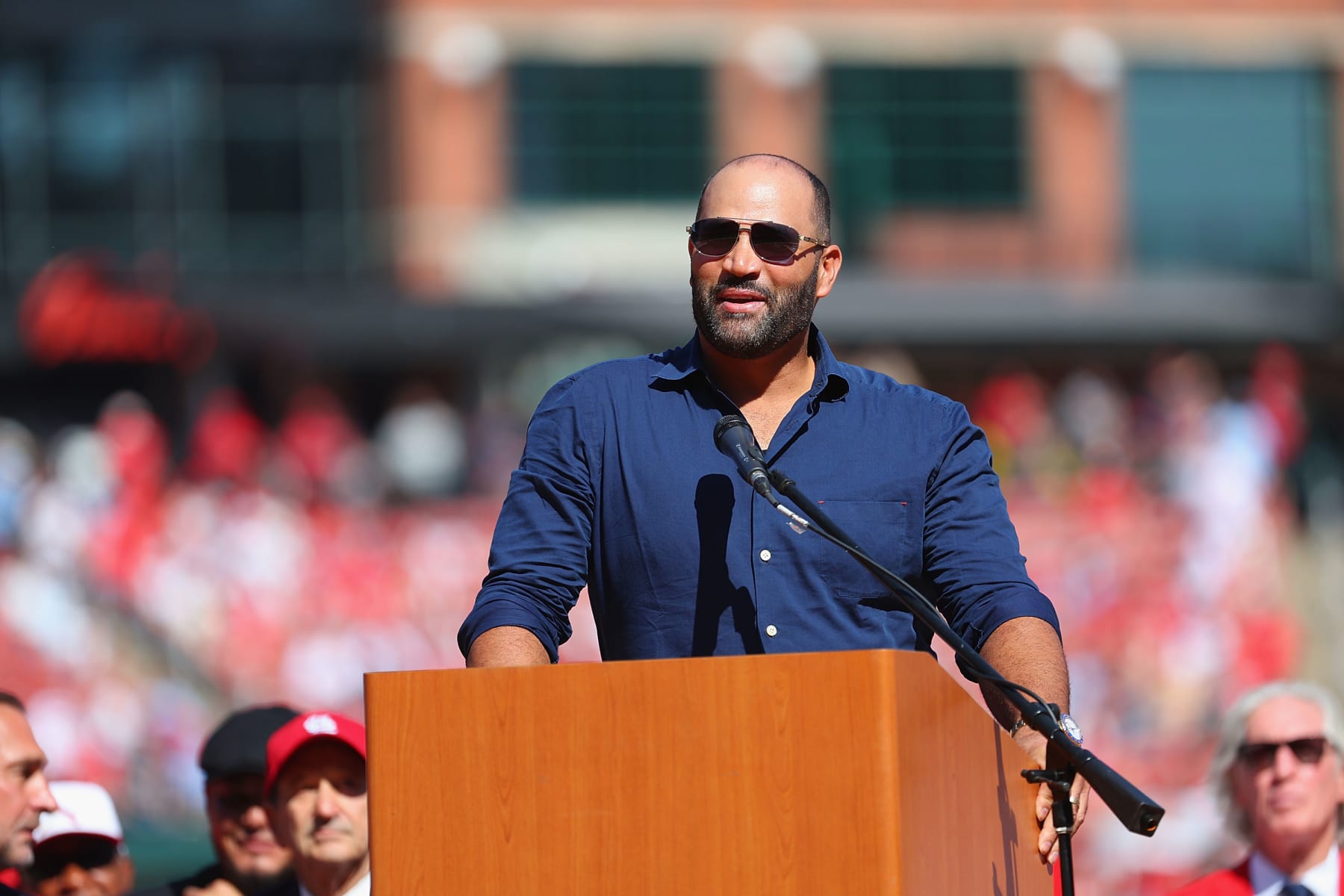ST LOUIS, MISSOURI - OCTOBER 1: Former St. Louis Cardinals Albert Pujols speaks during a pre-game retirement ceremony to honor Adam Wainwright #50 of the St. Louis Cardinals prior to a game against the Cincinnati Reds at Busch Stadium on October 1, 2023 in St Louis, Missouri. (Photo by Dilip Vishwanat/Getty Images)