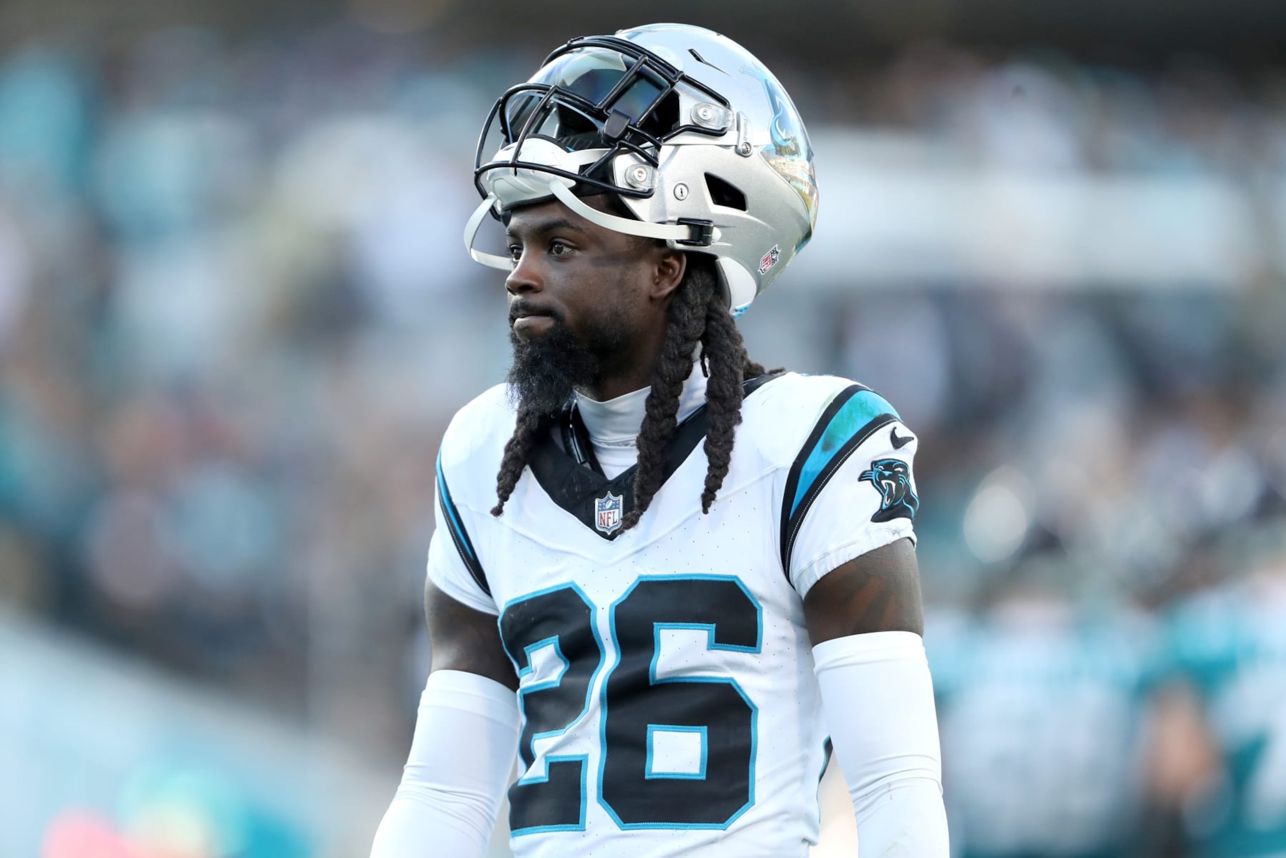JACKSONVILLE, FLORIDA - DECEMBER 31: Donte Jackson #26 looks on during the second half of a game against the Jacksonville Jaguars at EverBank Stadium on December 31, 2023 in Jacksonville, Florida. (Photo by Courtney Culbreath/Getty Images)