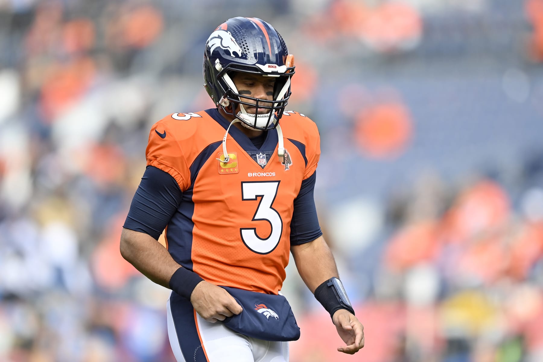DENVER, COLORADO - DECEMBER 31: Russell Wilson #3 of the Denver Broncos warms up prior to a game against the Los Angeles Chargers at Empower Field At Mile High on December 31, 2023 in Denver, Colorado. (Photo by Dustin Bradford/Getty Images)