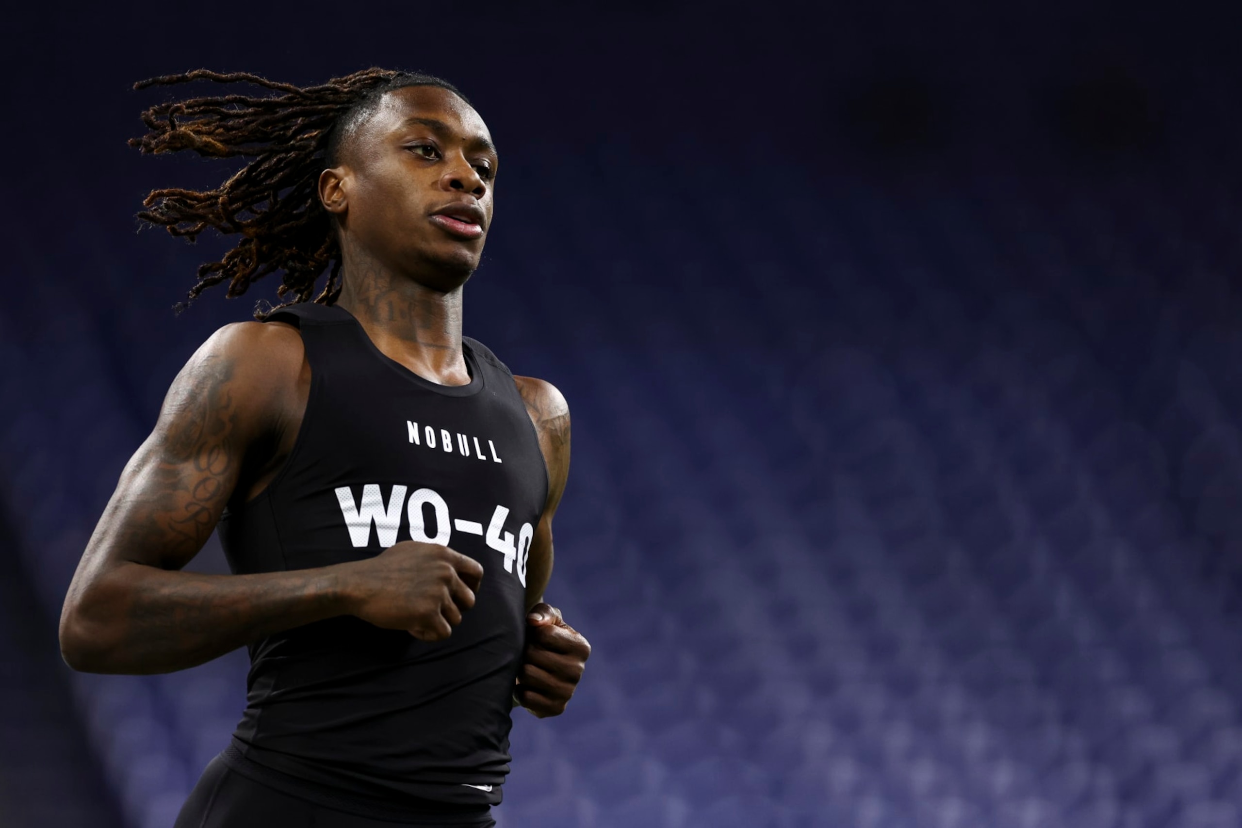 INDIANAPOLIS, INDIANA - MARCH 2: Xavier Worthy #WO40 of Texas runs the 40-yard dash during the NFL Combine at Lucas Oil Stadium on March 2, 2024 in Indianapolis, Indiana. (Photo by Kevin Sabitus/Getty Images)