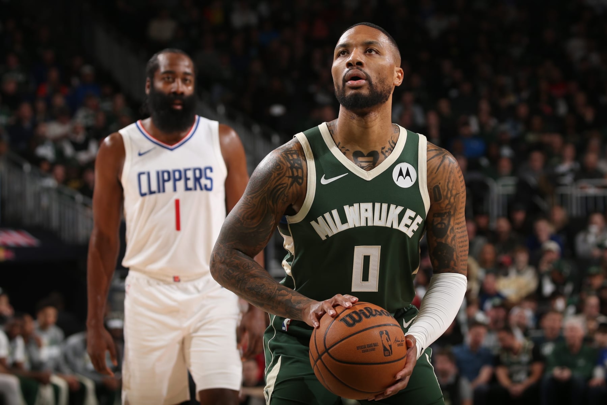 MILWAUKEE, WI - MARCH 4: Damian Lillard #0 of the Milwaukee Bucks shoots a free throw during the game against the LA Clippers on March 4, 2024 at the Fiserv Forum Center in Milwaukee, Wisconsin. NOTE TO USER: User expressly acknowledges and agrees that, by downloading and or using this Photograph, user is consenting to the terms and conditions of the Getty Images License Agreement. Mandatory Copyright Notice: Copyright 2024 NBAE (Photo by Gary Dineen/NBAE via Getty Images). MILWAUKEE, WI - MARCH 4: Damian Lillard #0 of the Milwaukee Bucks shoots a free throw during the game against the LA Clippers on March 4, 2024 at the Fiserv Forum Center in Milwaukee, Wisconsin. NOTE TO USER: User expressly acknowledges and agrees that, by downloading and or using this Photograph, user is consenting to the terms and conditions of the Getty Images License Agreement. Mandatory Copyright Notice: Copyright 2024 NBAE (Photo by Gary Dineen/NBAE via Getty Images).