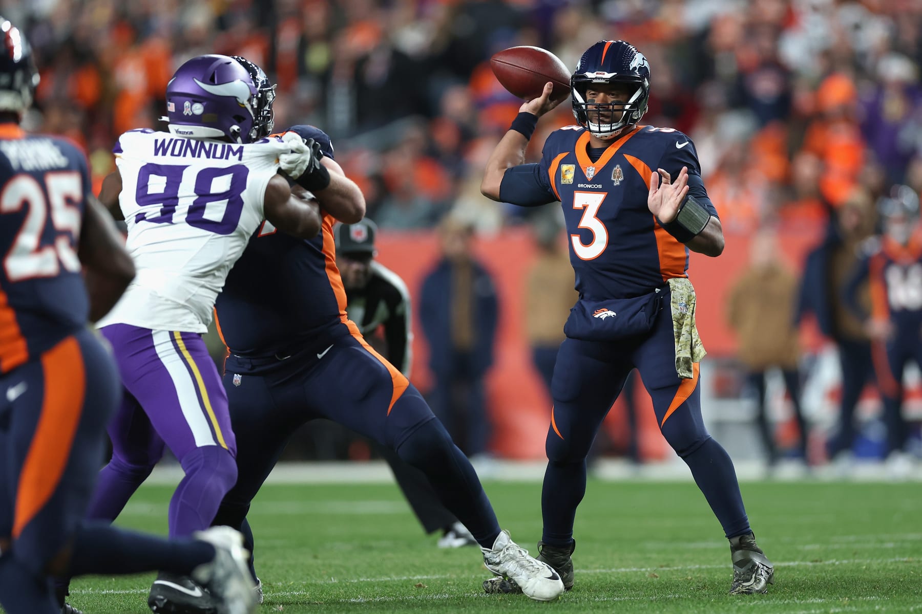 DENVER, COLORADO - NOVEMBER 19: Quarterback Russell Wilson #3 of the Denver Broncos throws a pass during the first quarter of the NFL game against the Minnesota Vikings at Empower Field At Mile High on November 19, 2023 in Denver, Colorado. (Photo by Matthew Stockman/Getty Images)
