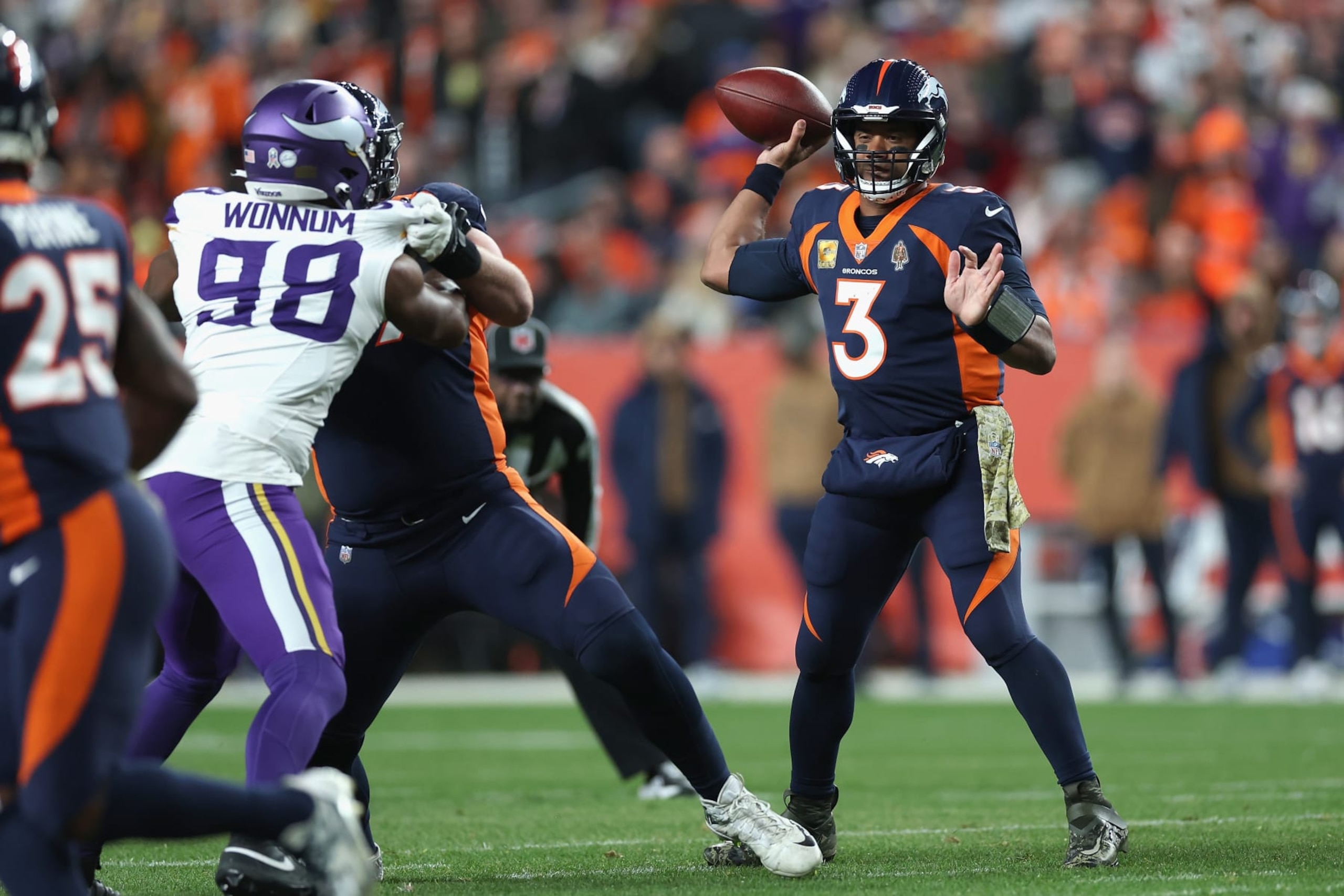 DENVER, COLORADO - NOVEMBER 19: Quarterback Russell Wilson #3 of the Denver Broncos throws a pass during the first quarter of the NFL game against the Minnesota Vikings at Empower Field At Mile High on November 19, 2023 in Denver, Colorado. (Photo by Matthew Stockman/Getty Images)