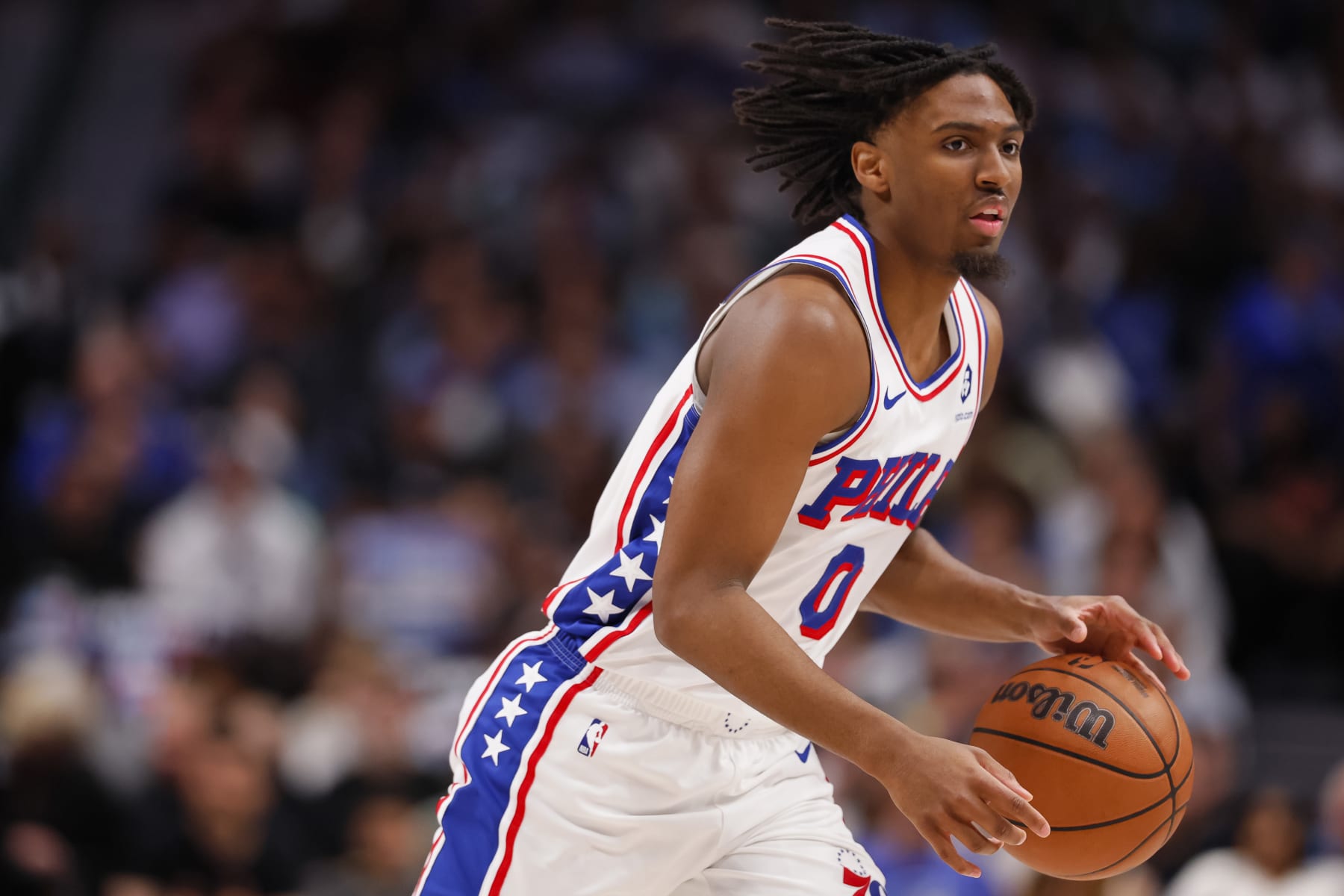 DALLAS, TEXAS - MARCH 03: Tyrese Maxey #0 of the Philadelphia 76ers controls the ball during the first half against the Dallas Mavericks at American Airlines Center on March 03, 2024 in Dallas, Texas. NOTE TO USER: User expressly acknowledges and agrees that, by downloading and or using this photograph, User is consenting to the terms and conditions of the Getty Images License Agreement. (Photo by Sam Hodde/Getty Images)